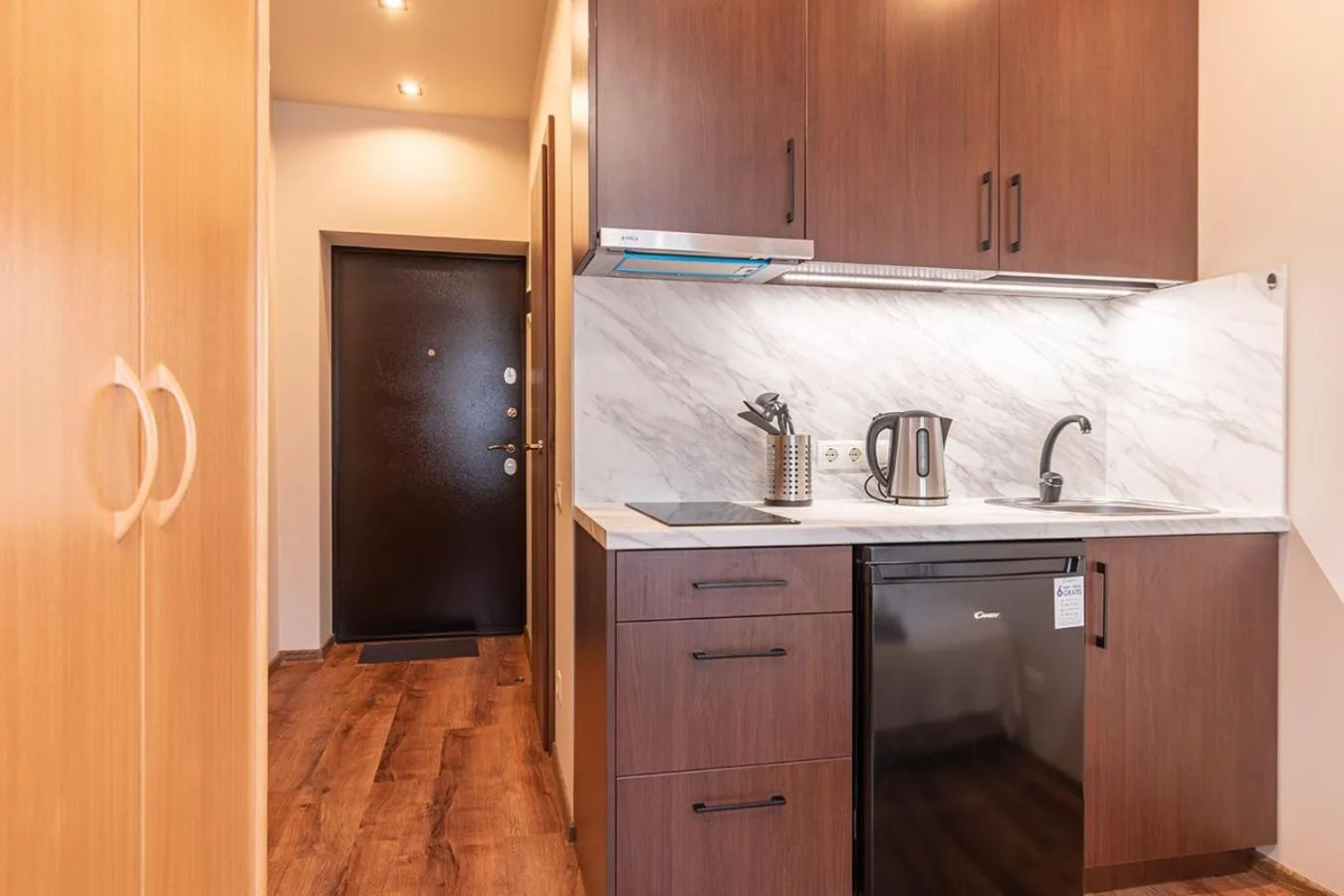 Kitchen or kitchenette in RVR Smart Apartments Riga with Free Parking and Self Check-in