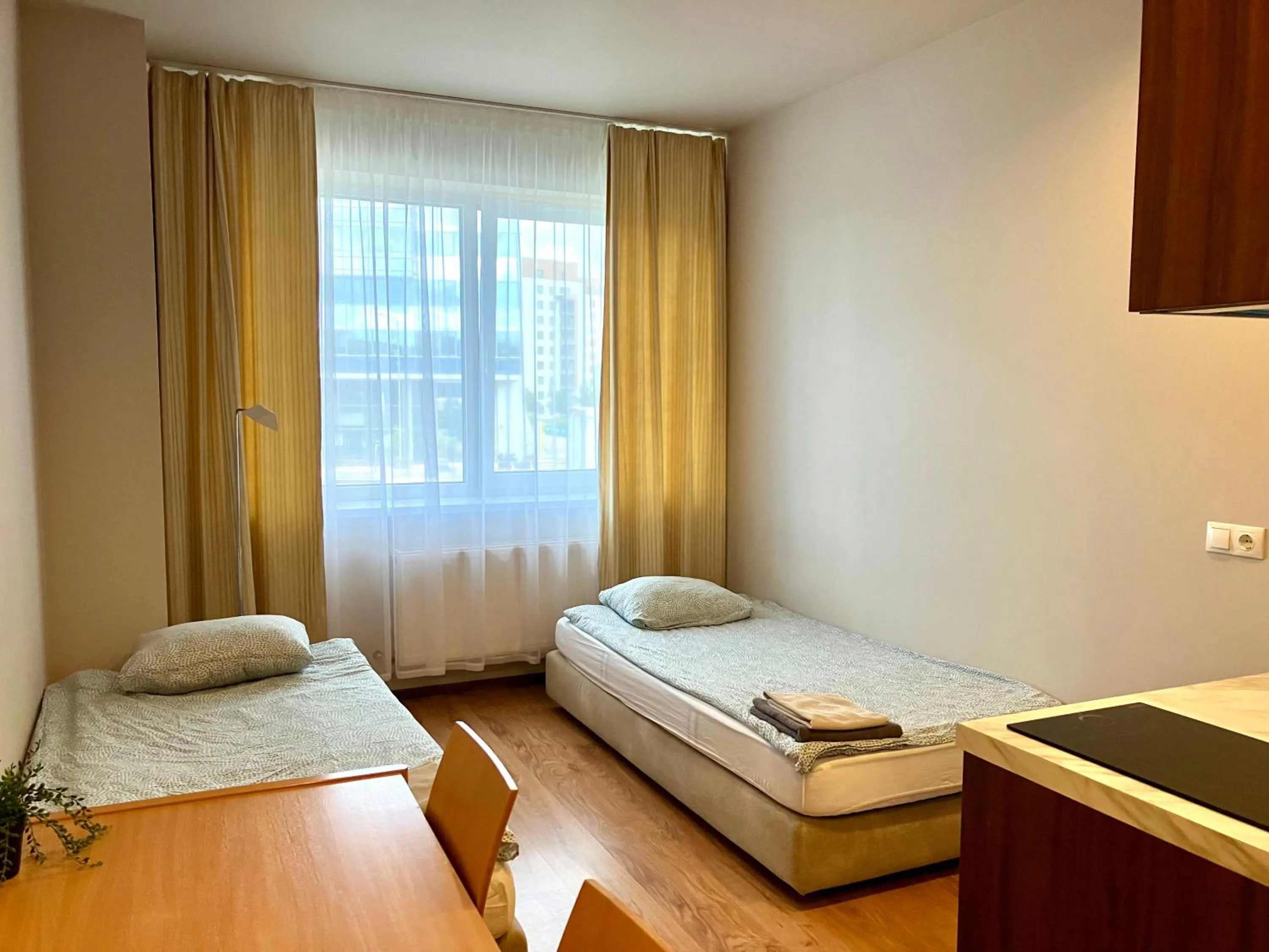 Photo of the whole room, Bed in RVR Smart Apartments Riga with Free Parking and Self Check-in