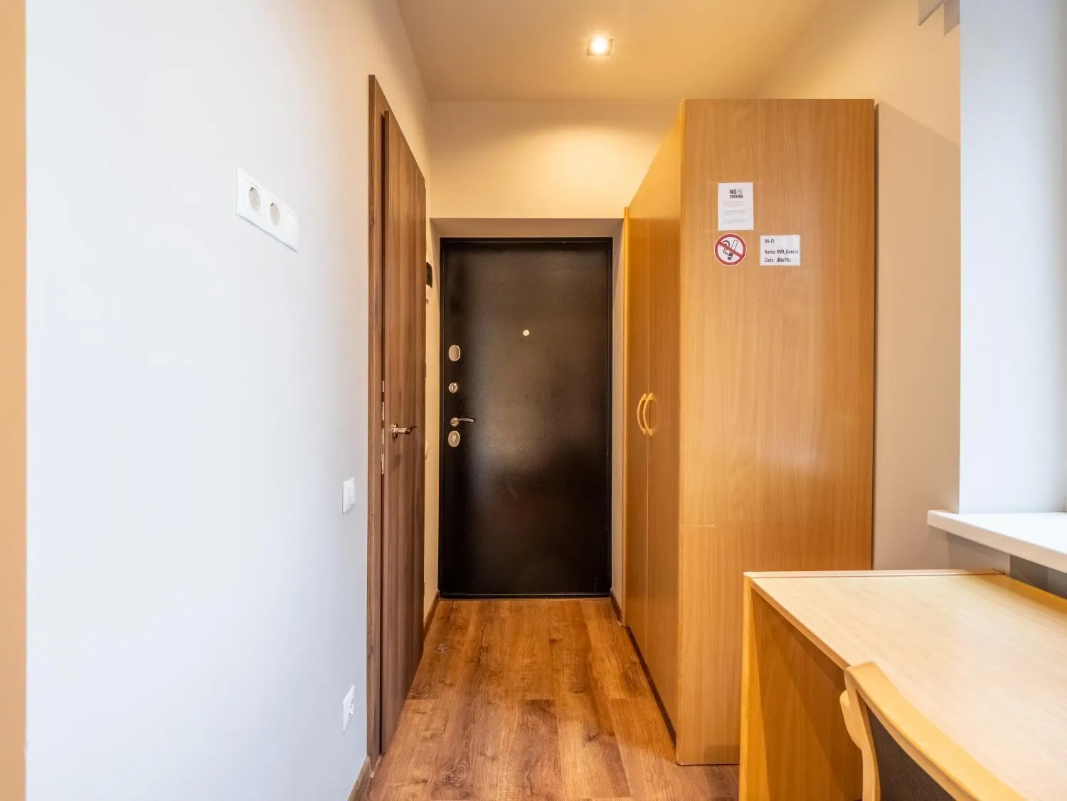 wardrobe in RVR Smart Apartments Riga with Free Parking and Self Check-in