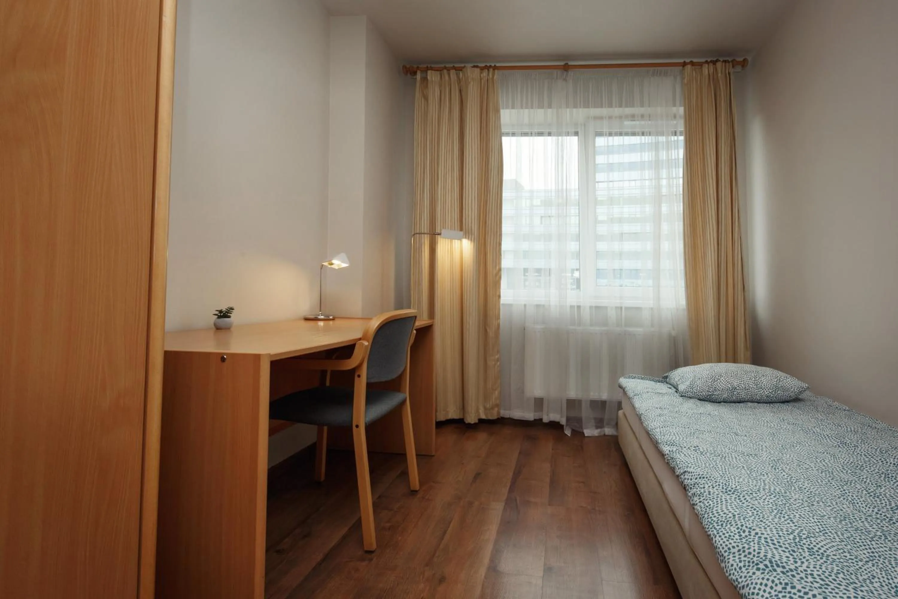 Photo of the whole room, Bed in RVR Smart Apartments Riga with Free Parking and Self Check-in