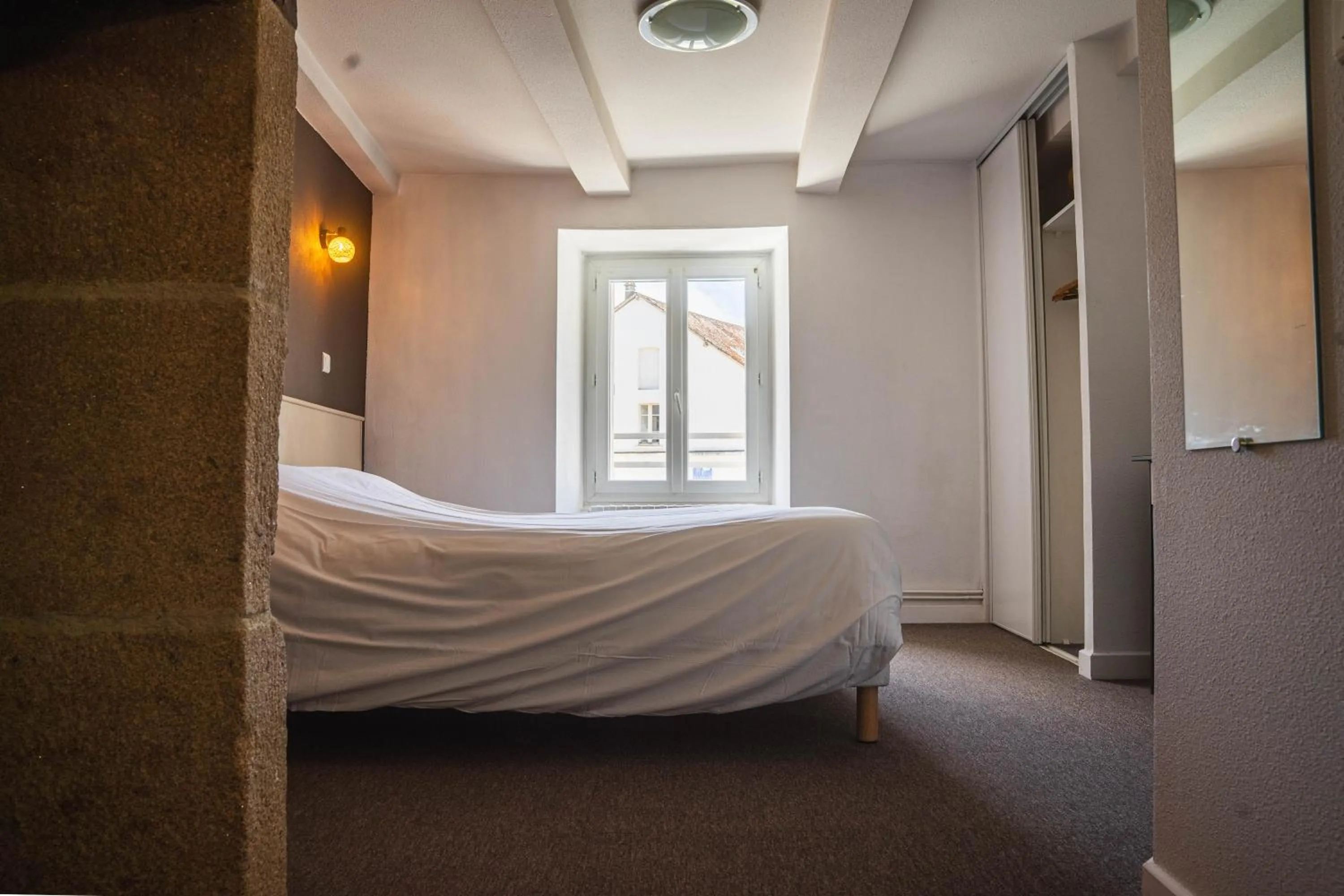 Bed in Logis Hotel Eben