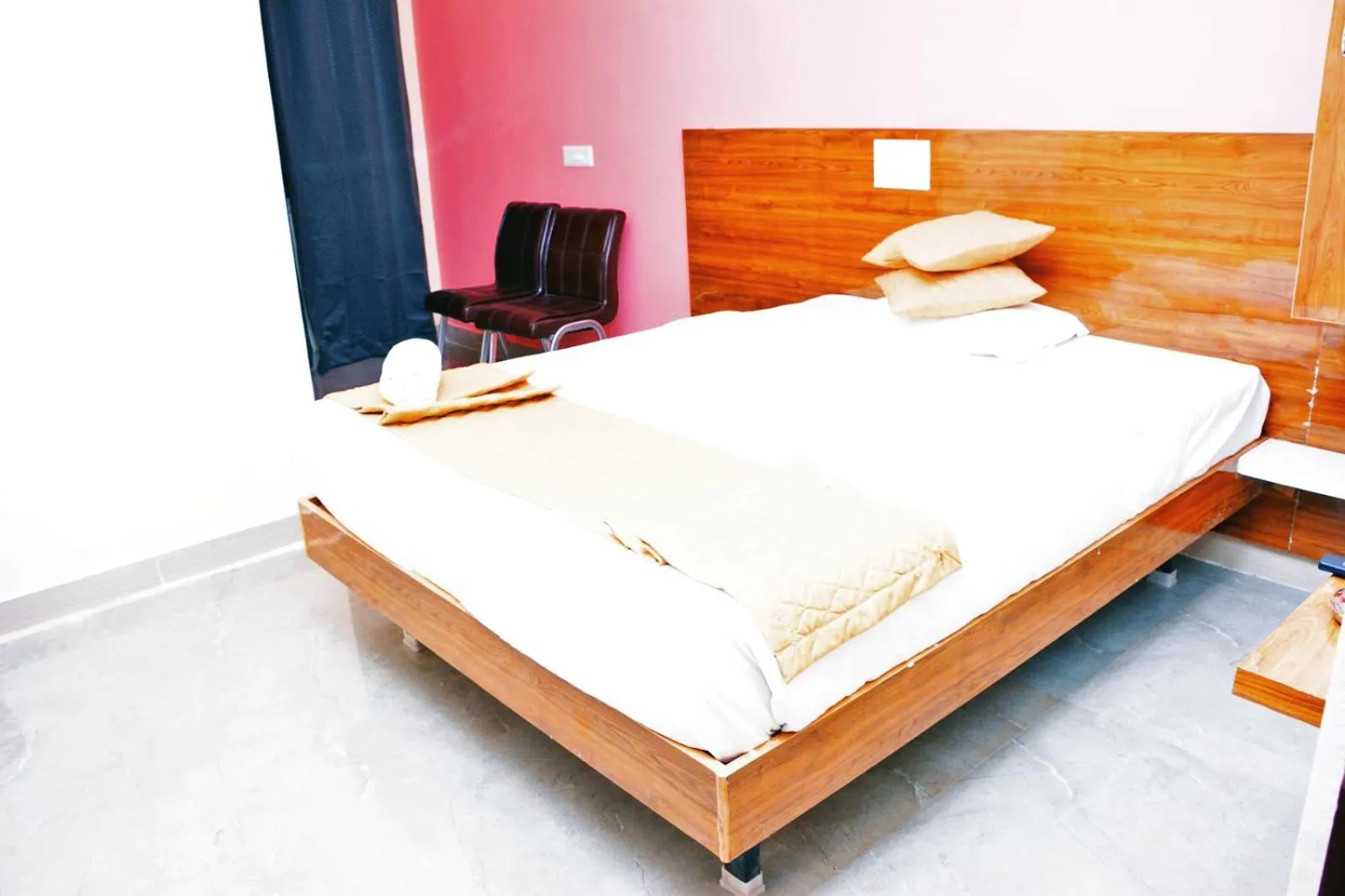 Bedroom in Udupi Deluxe Lodge Gulbarga