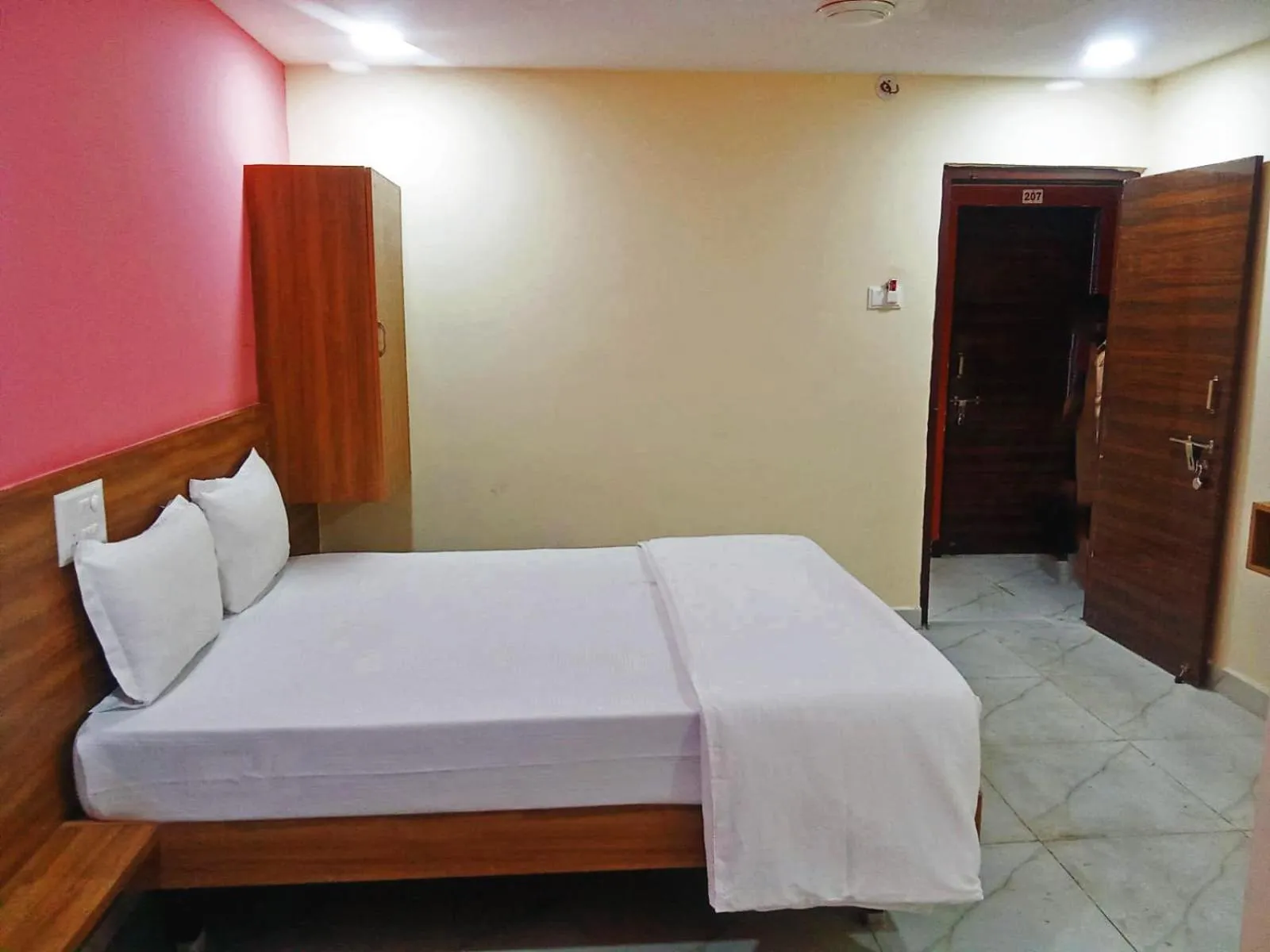 Bedroom in Udupi Deluxe Lodge Gulbarga