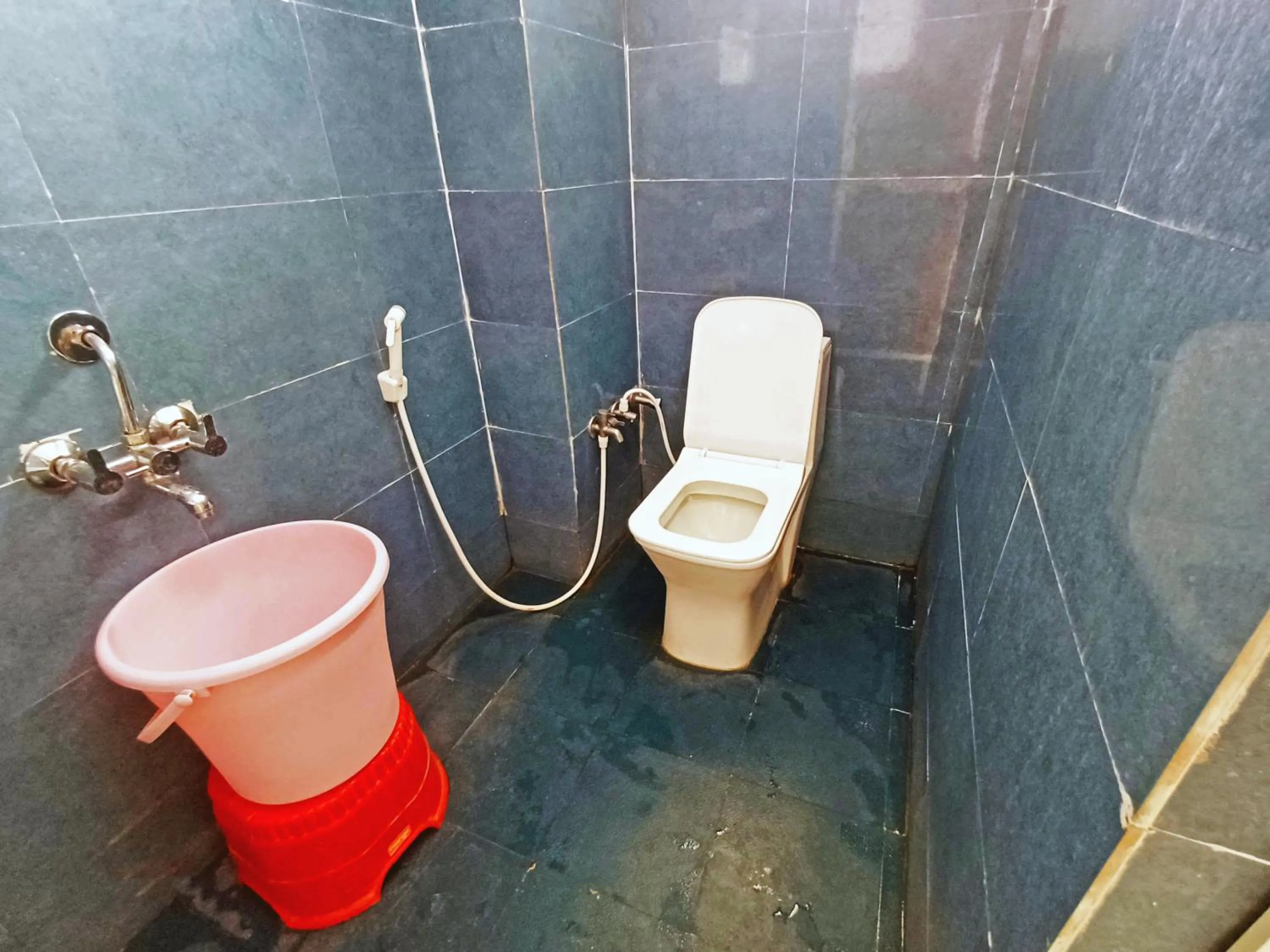 Bathroom in Udupi Deluxe Lodge Gulbarga