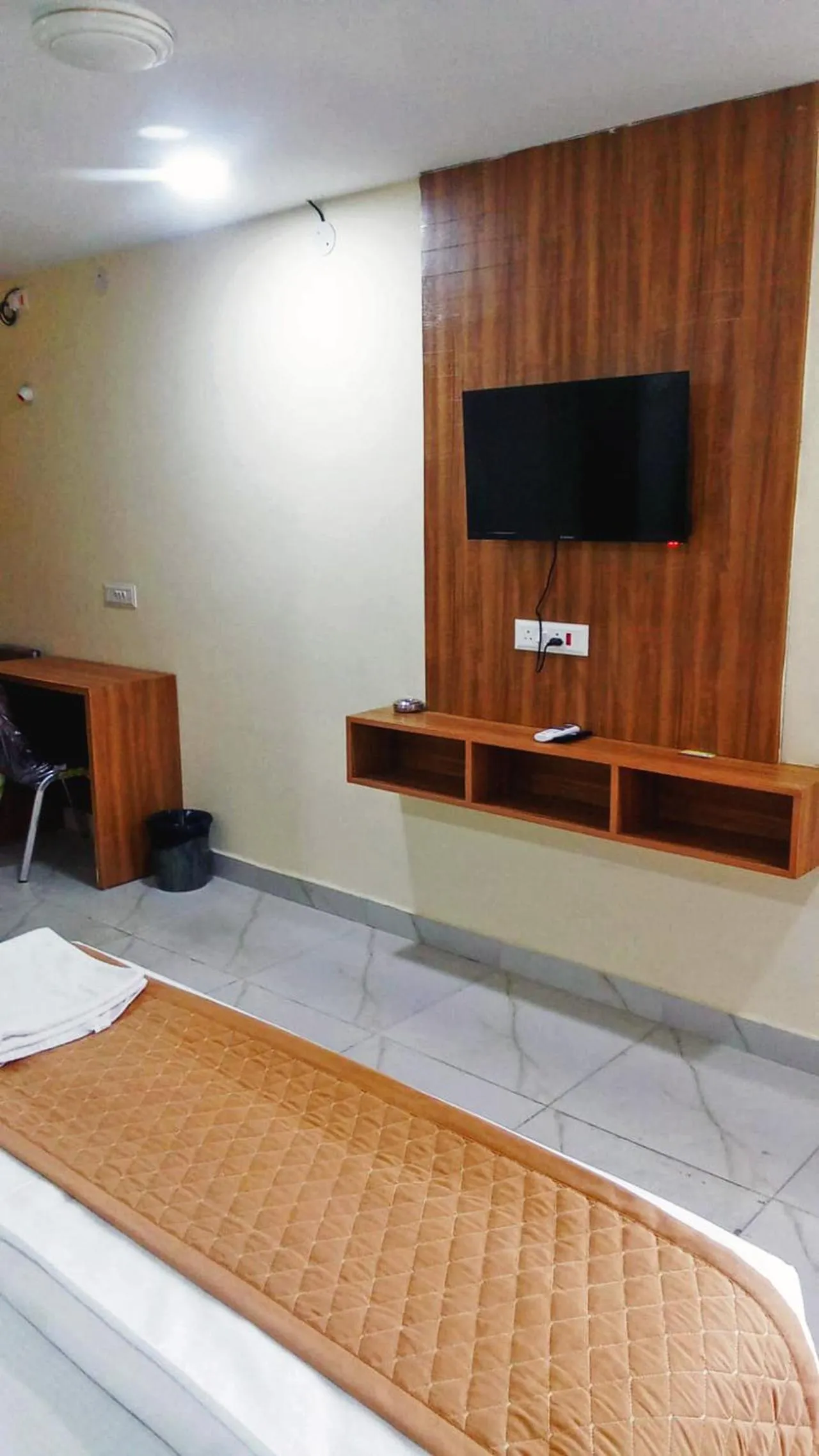 Bedroom in Udupi Deluxe Lodge Gulbarga