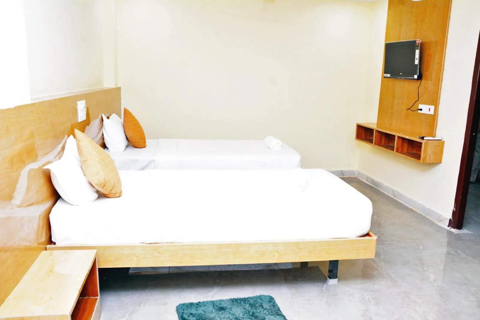 Bedroom in Udupi Deluxe Lodge Gulbarga