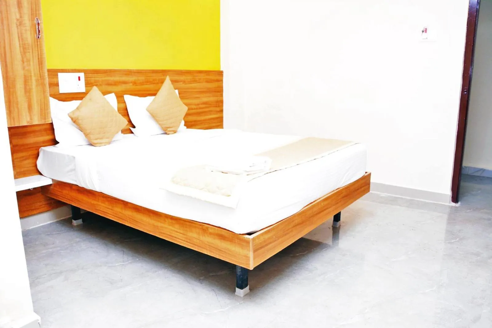 Bedroom in Udupi Deluxe Lodge Gulbarga