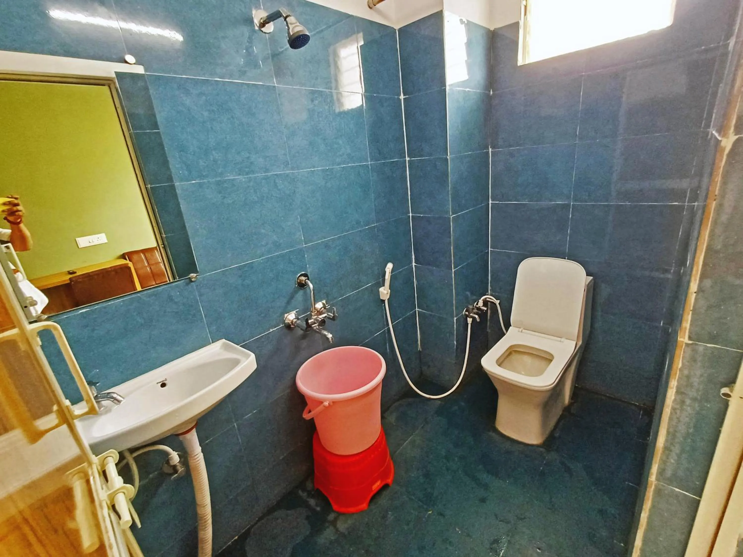 Bathroom in Udupi Deluxe Lodge Gulbarga
