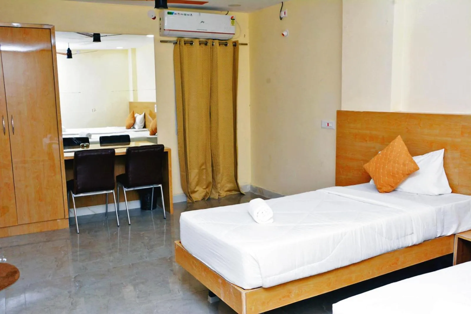 Bedroom in Udupi Deluxe Lodge Gulbarga