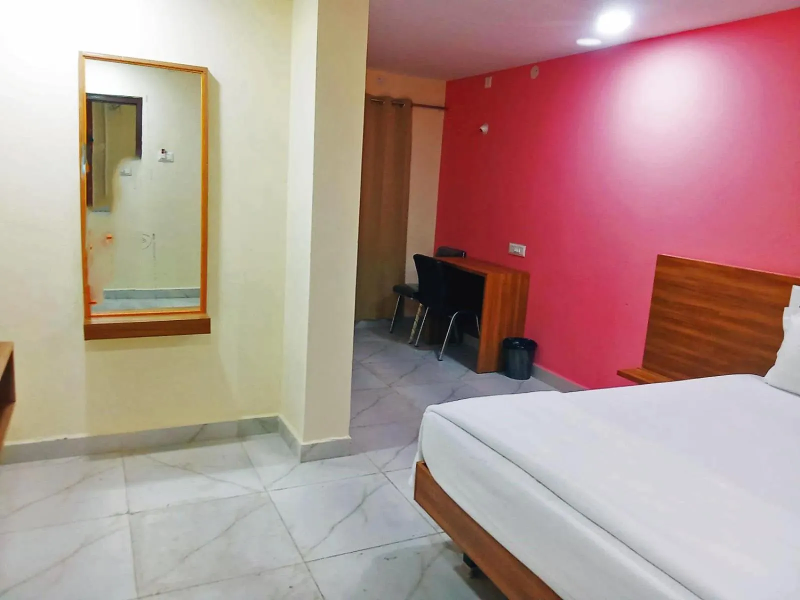 Bedroom in Udupi Deluxe Lodge Gulbarga