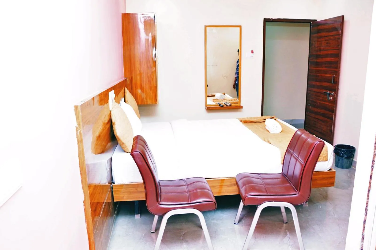 Bedroom in Udupi Deluxe Lodge Gulbarga