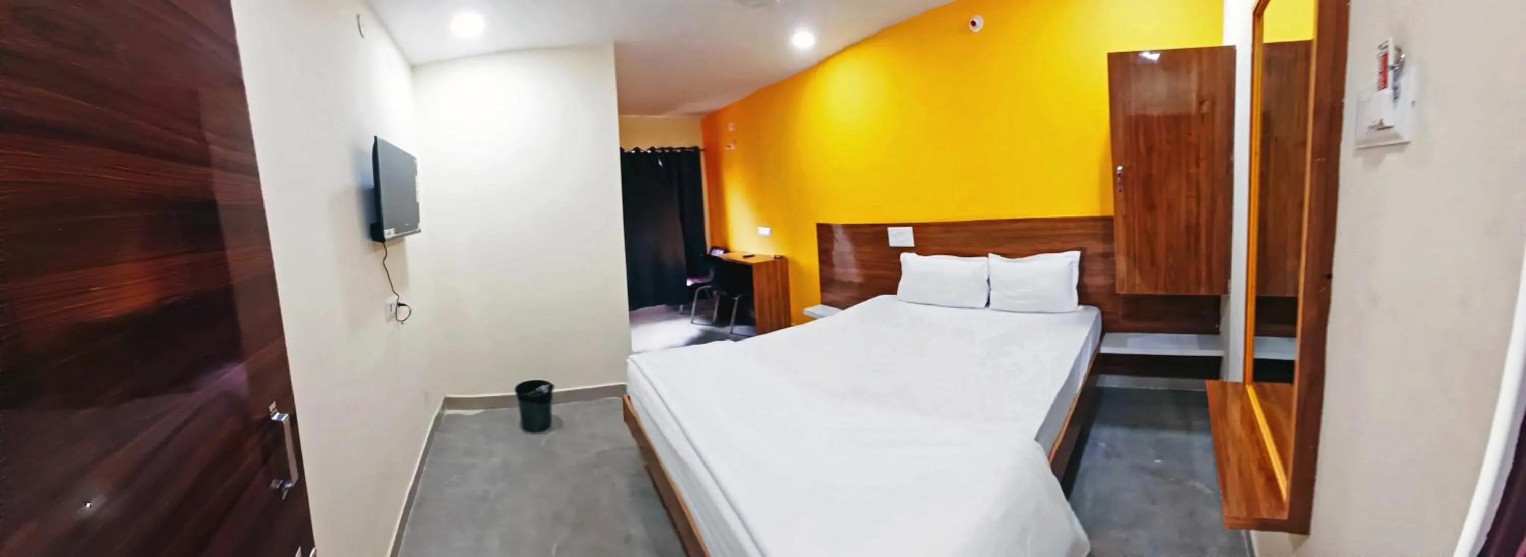 Bedroom in Udupi Deluxe Lodge Gulbarga