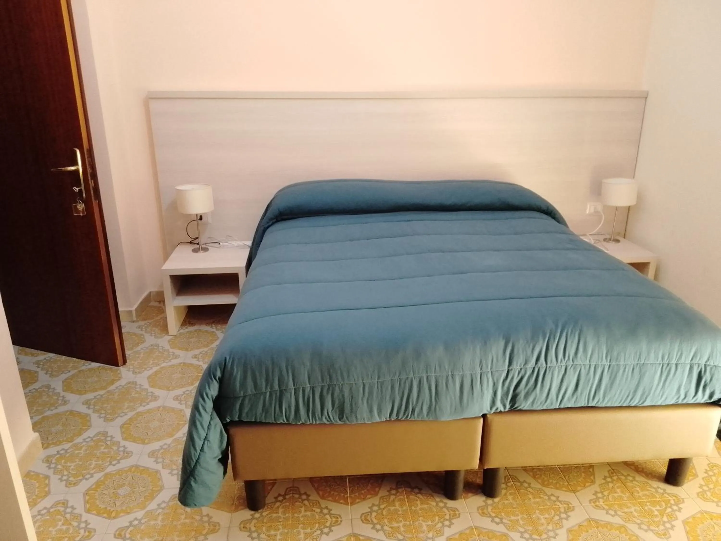 Bed in Albergo Maria Cristina