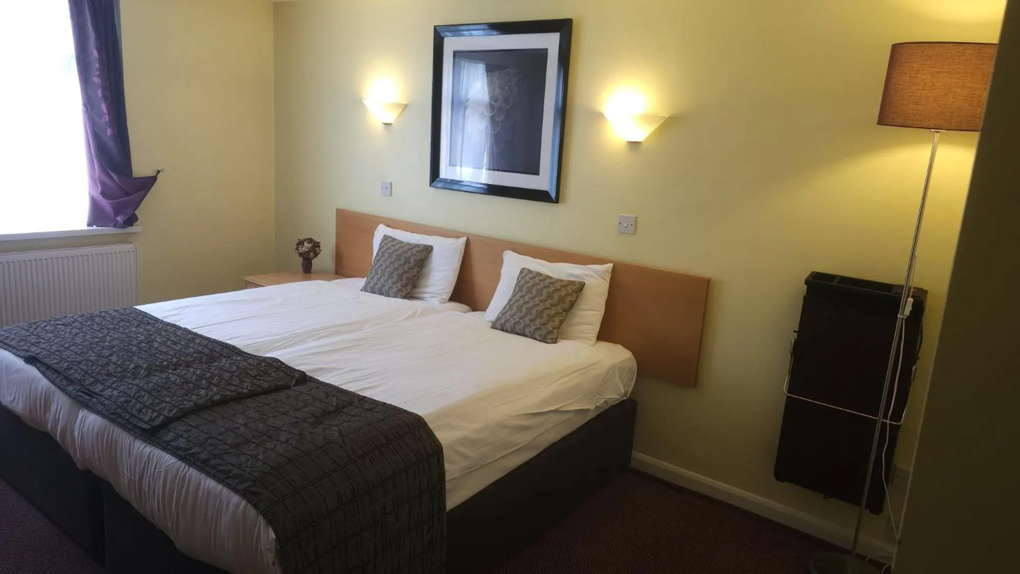 Bed in The Abbey House Hotel