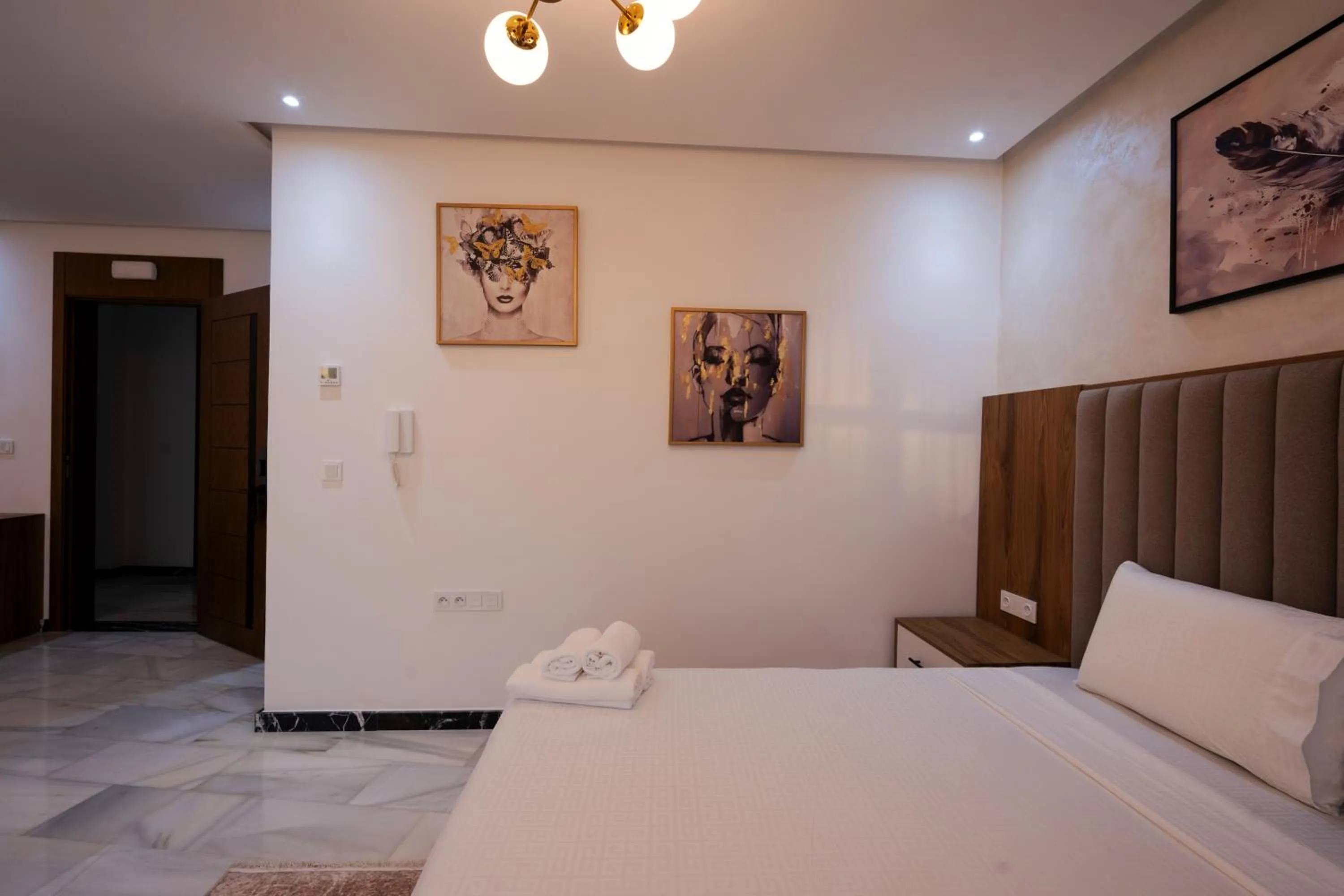 Bed in IMMOKA SUITEs