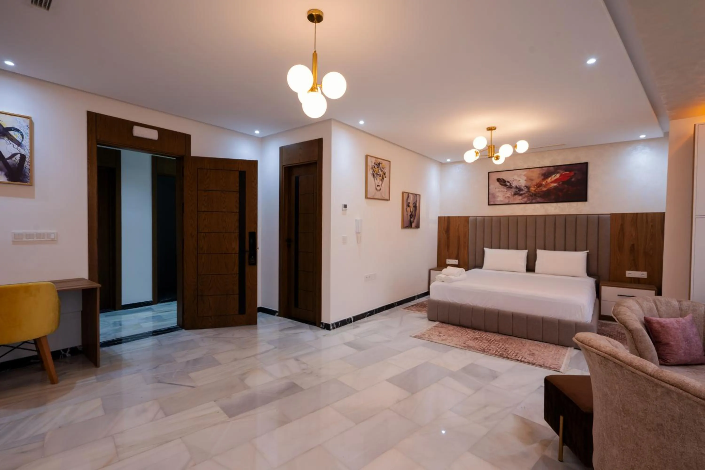 Bed in IMMOKA SUITEs