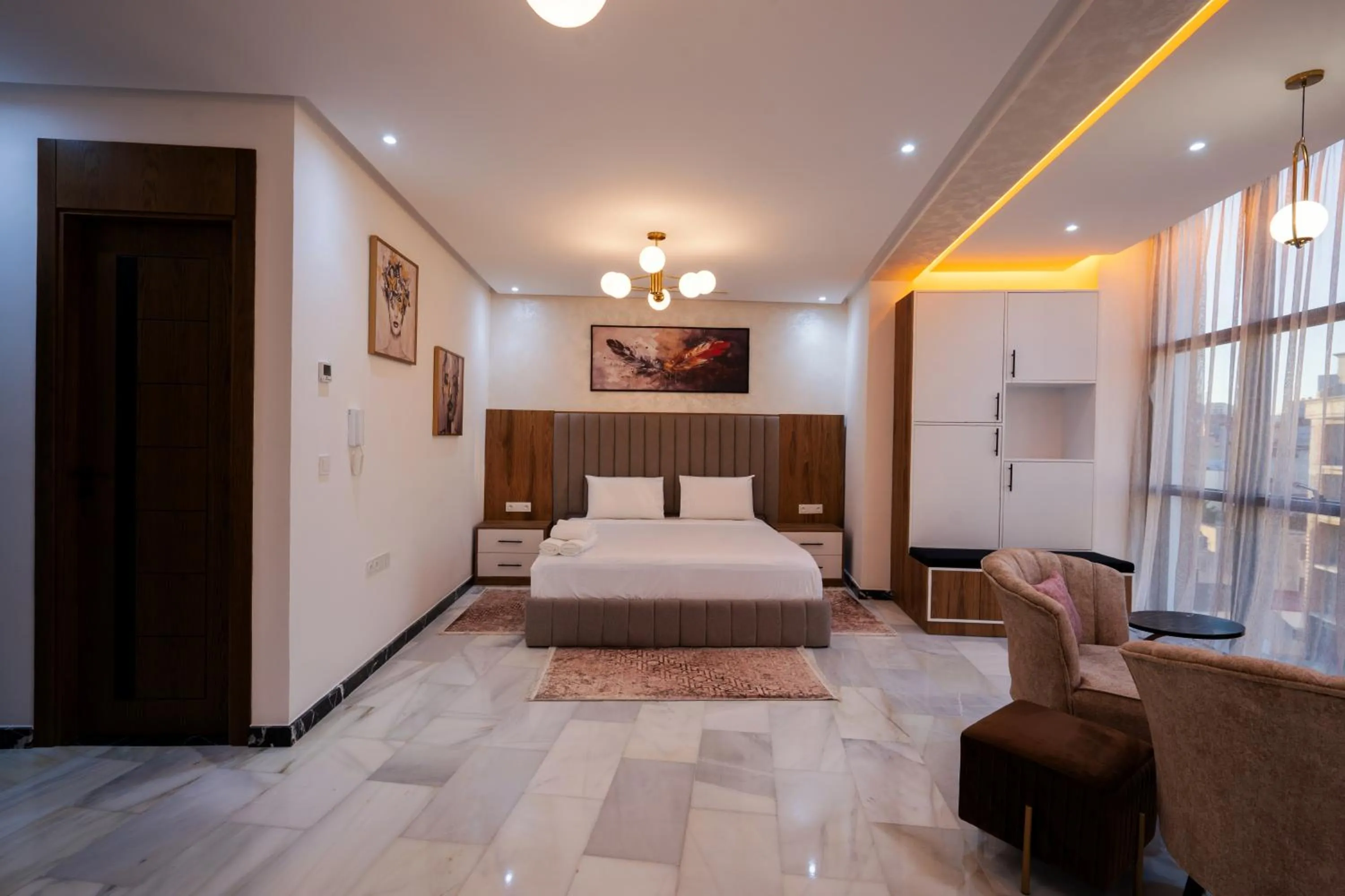Bed in IMMOKA SUITEs