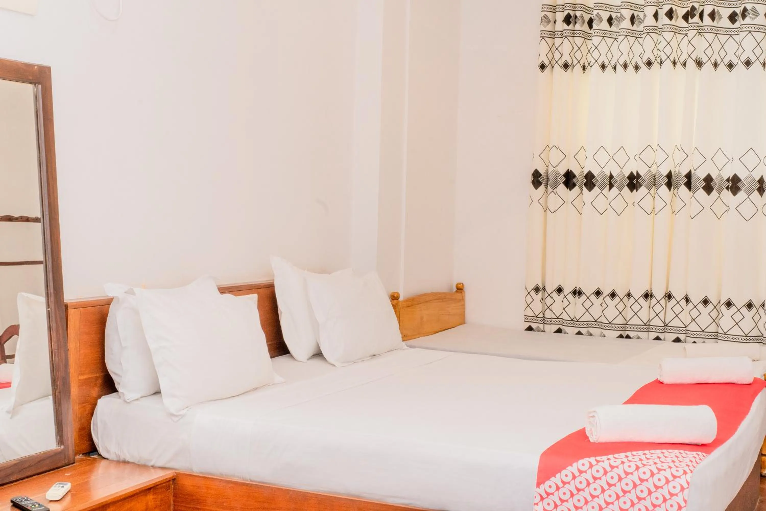 Bed in New Wave Beach Resort Unawatuna