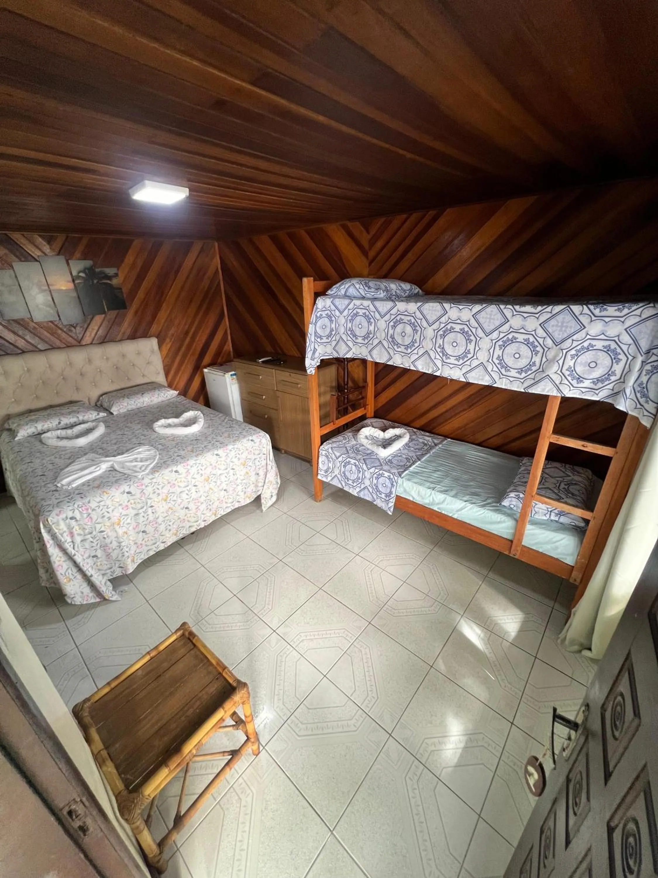 Bed in Pousada Coração da Ilha