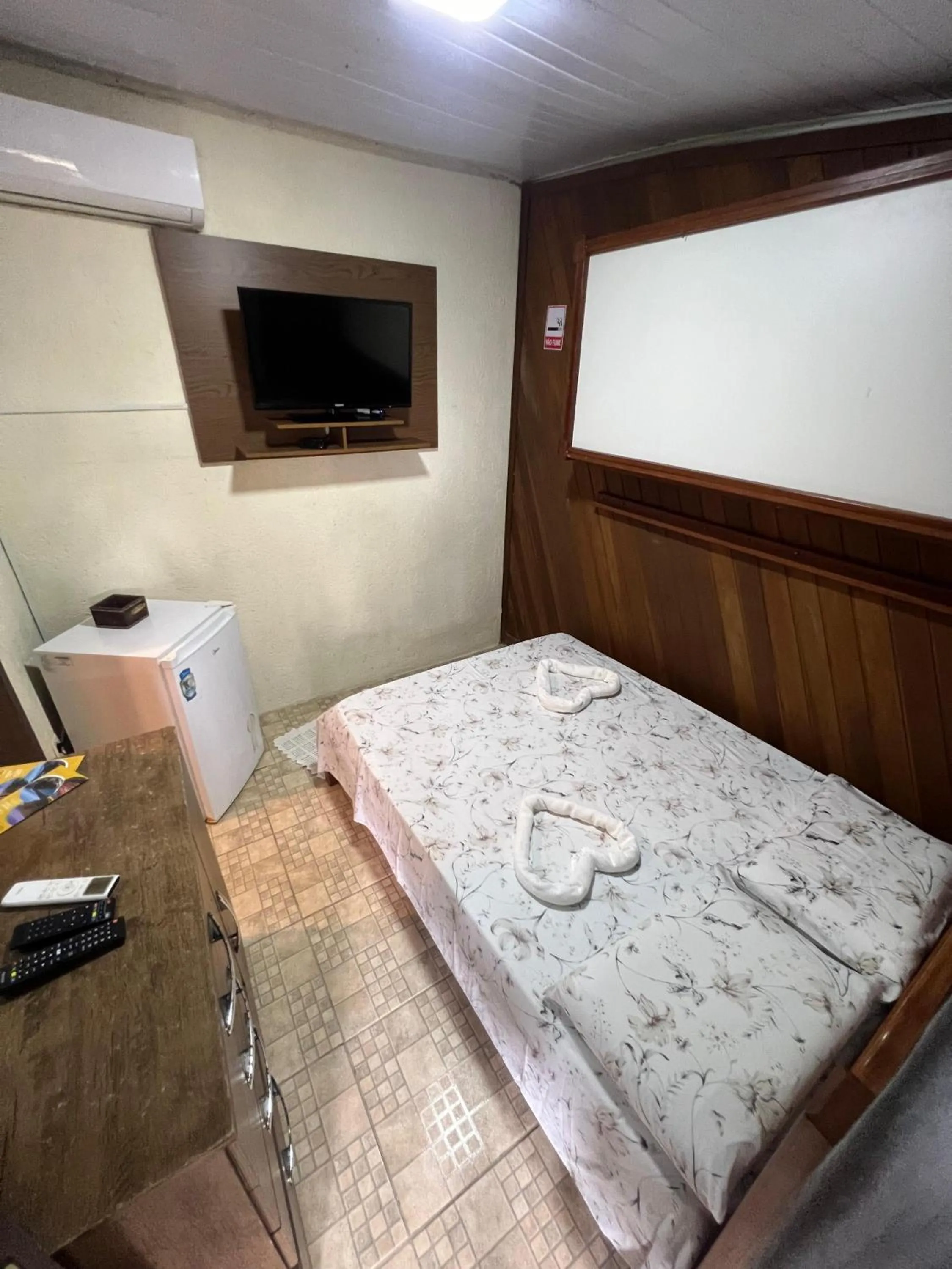 Bed in Pousada Coração da Ilha