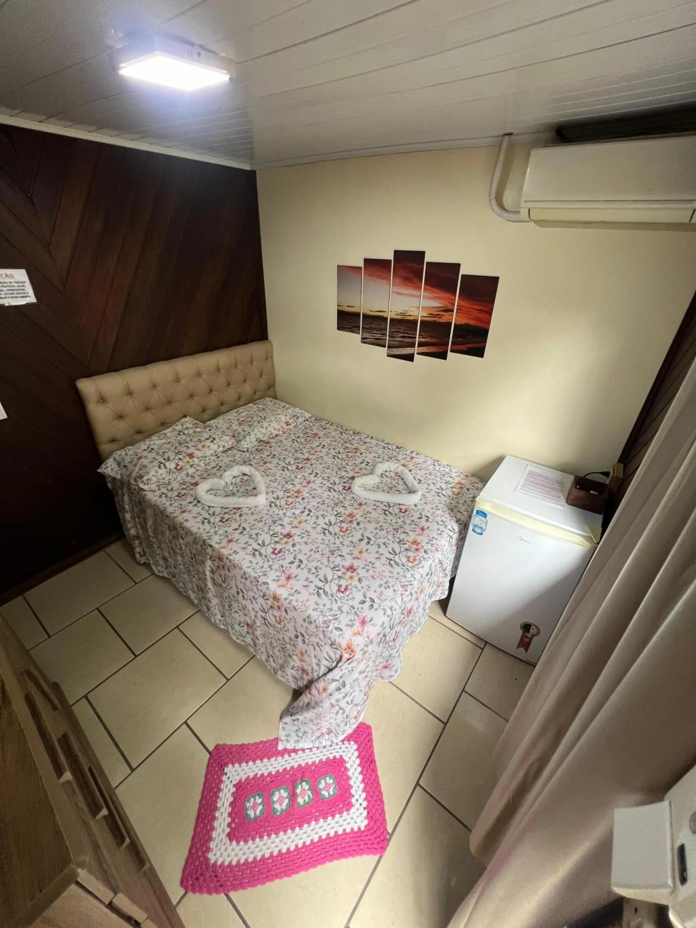 Bed in Pousada Coração da Ilha