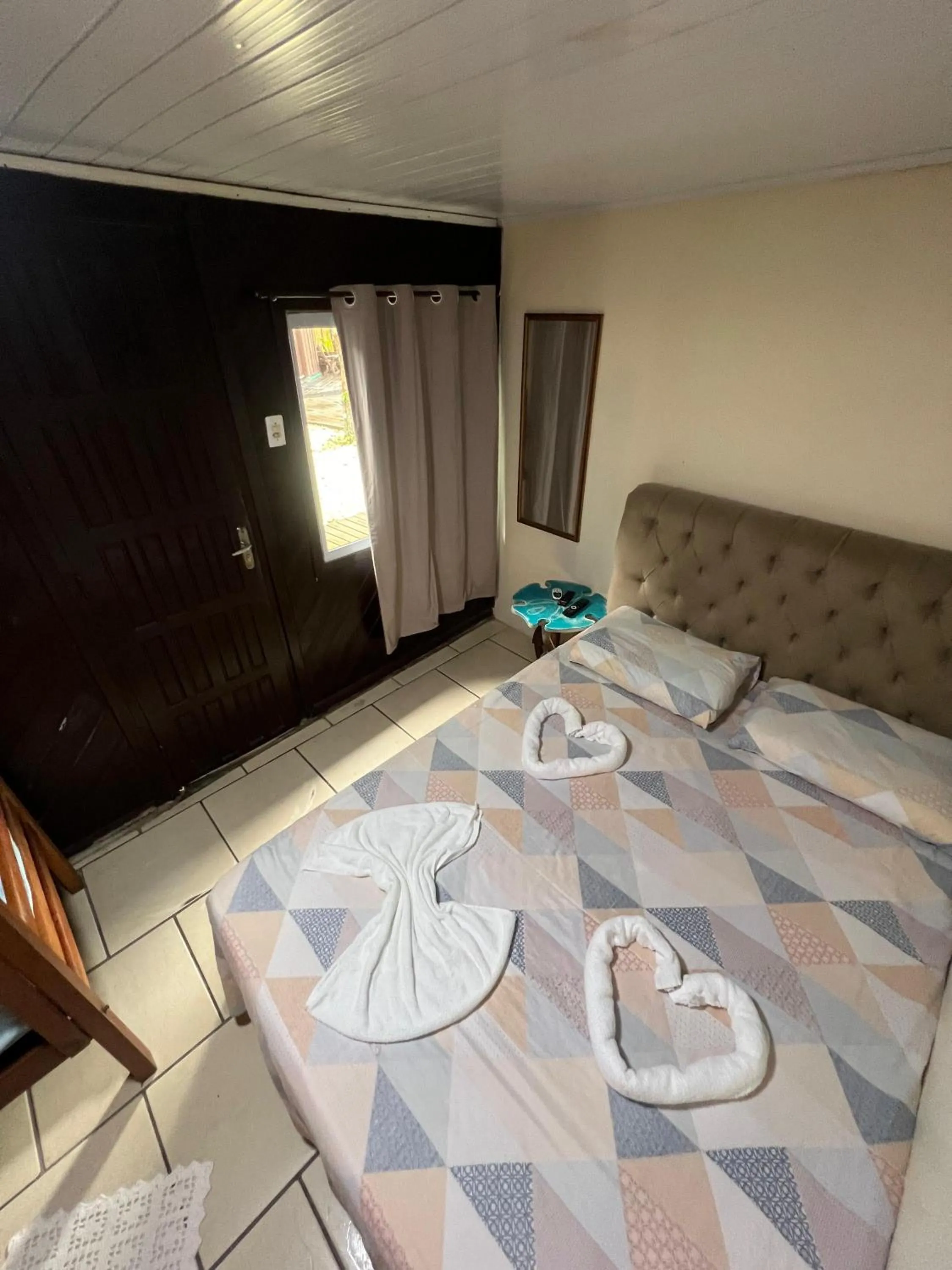 Bed in Pousada Coração da Ilha