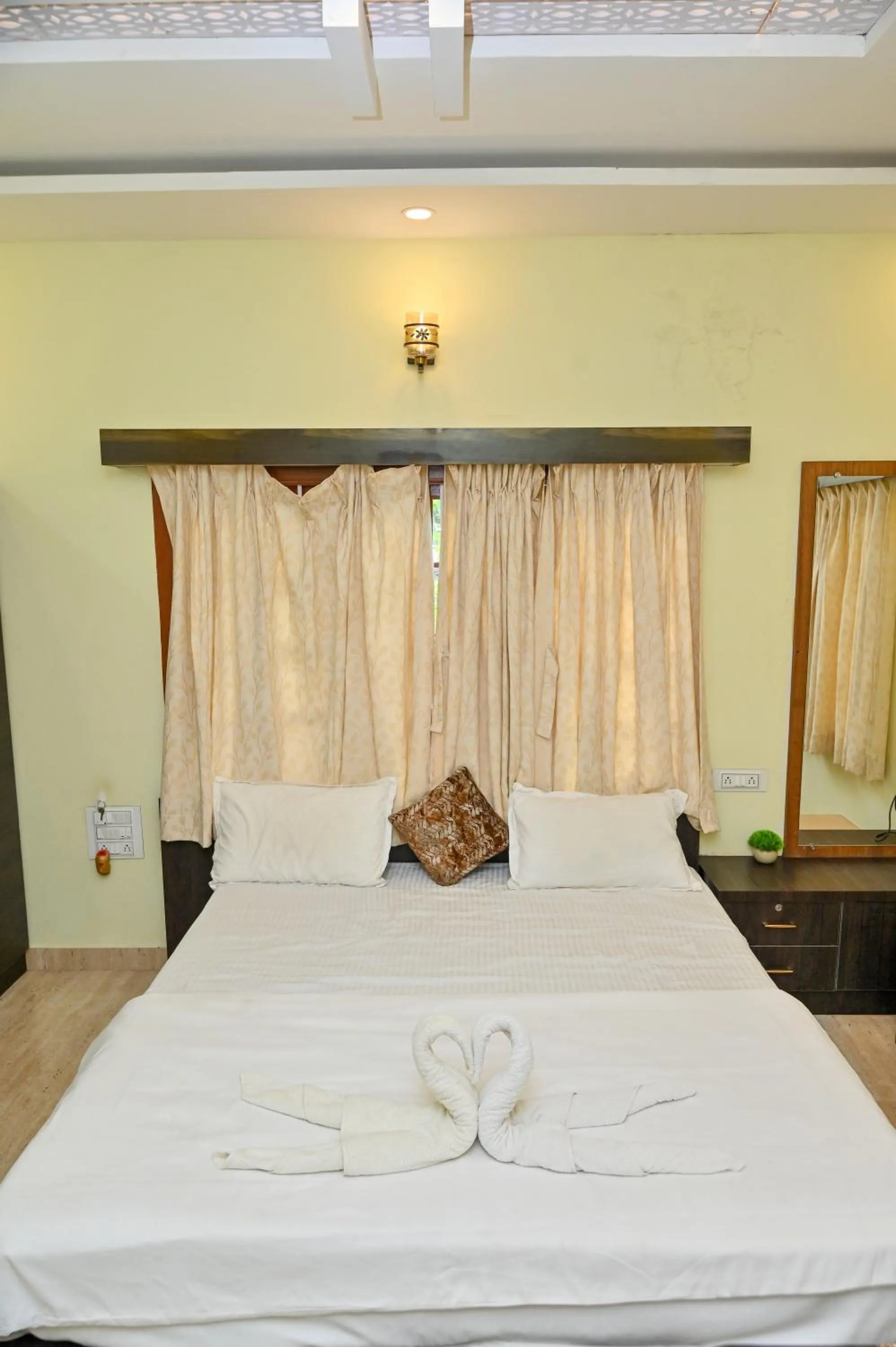 Bed in NAVARATHNA International resort