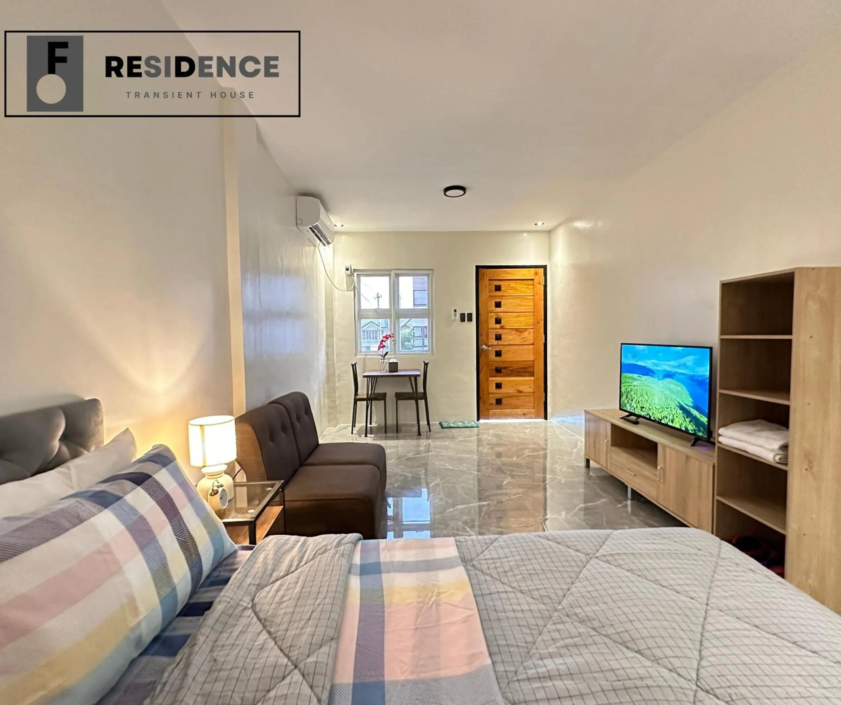 Bed in F Residence Transient House