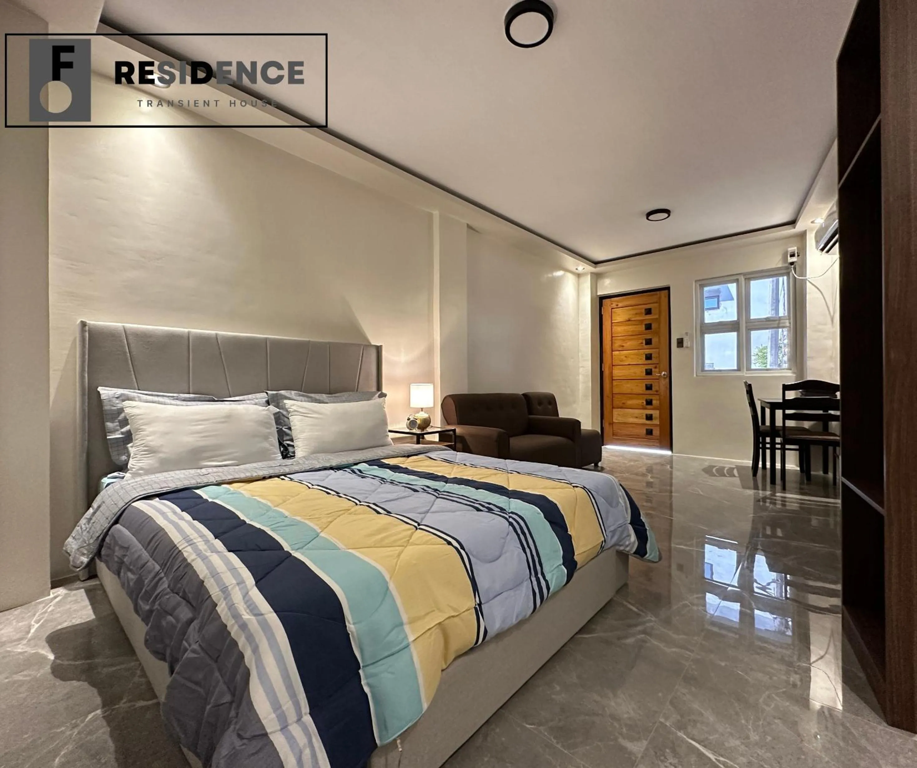 Bed in F Residence Transient House