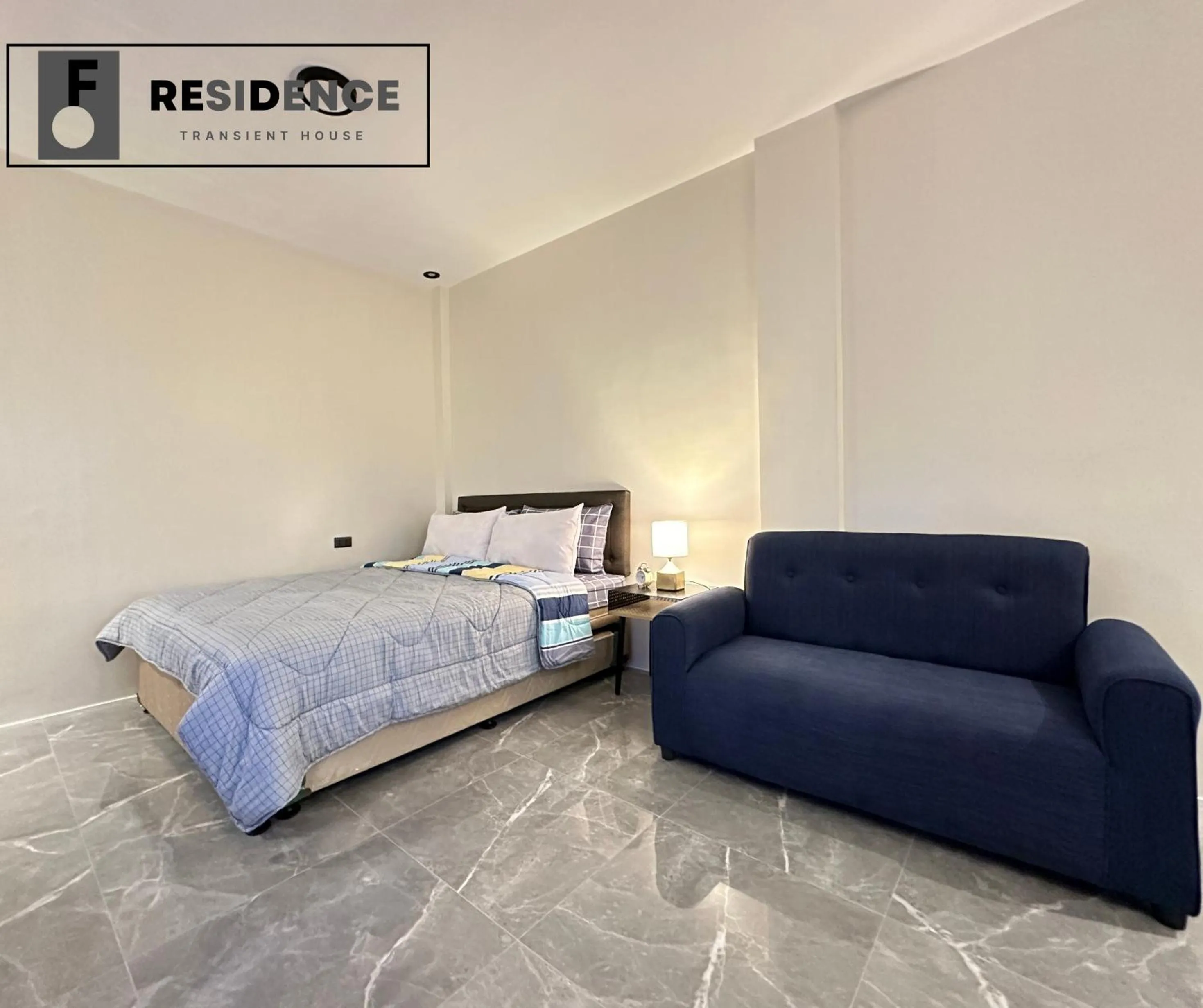 Bed in F Residence Transient House