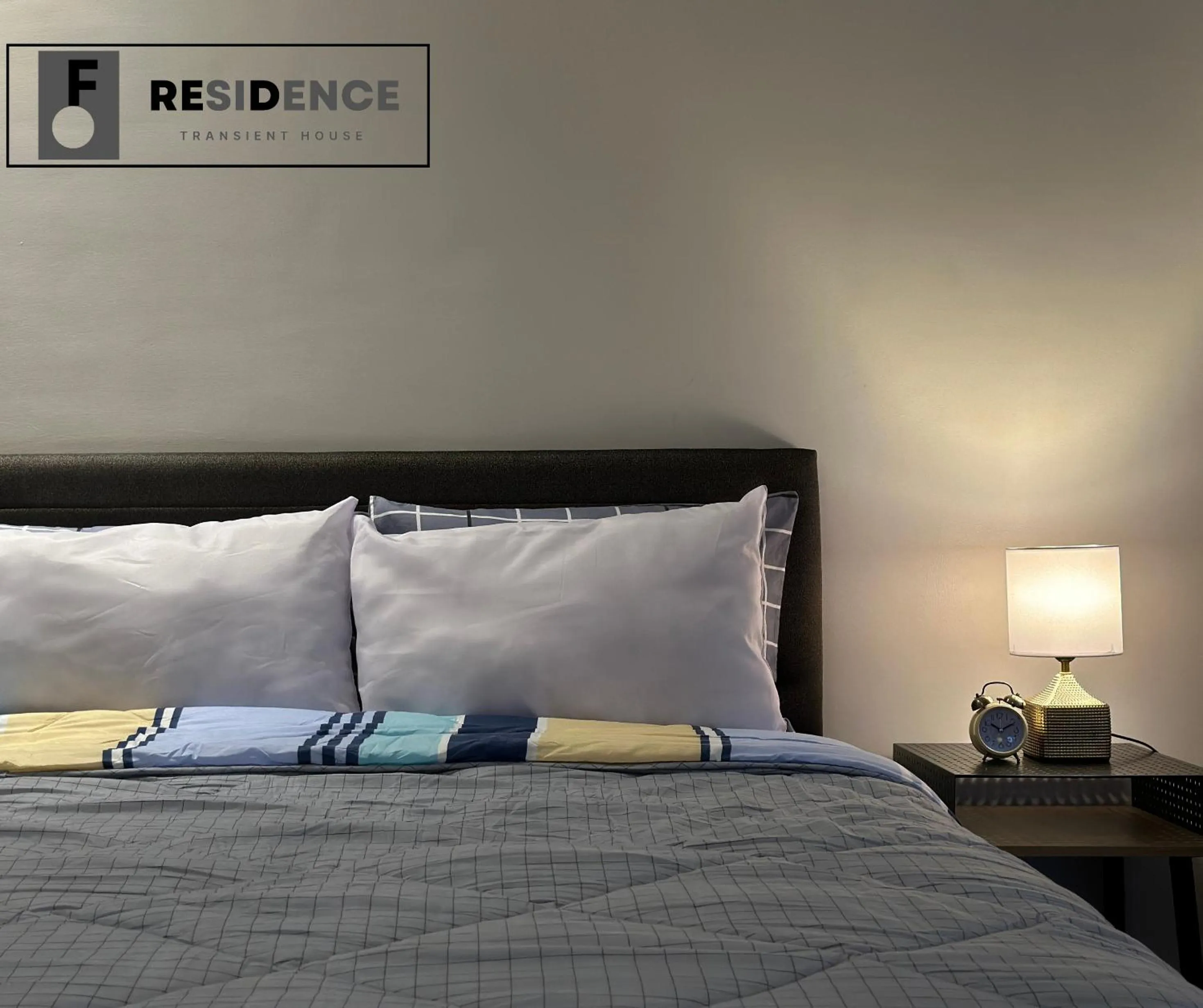 Bed in F Residence Transient House