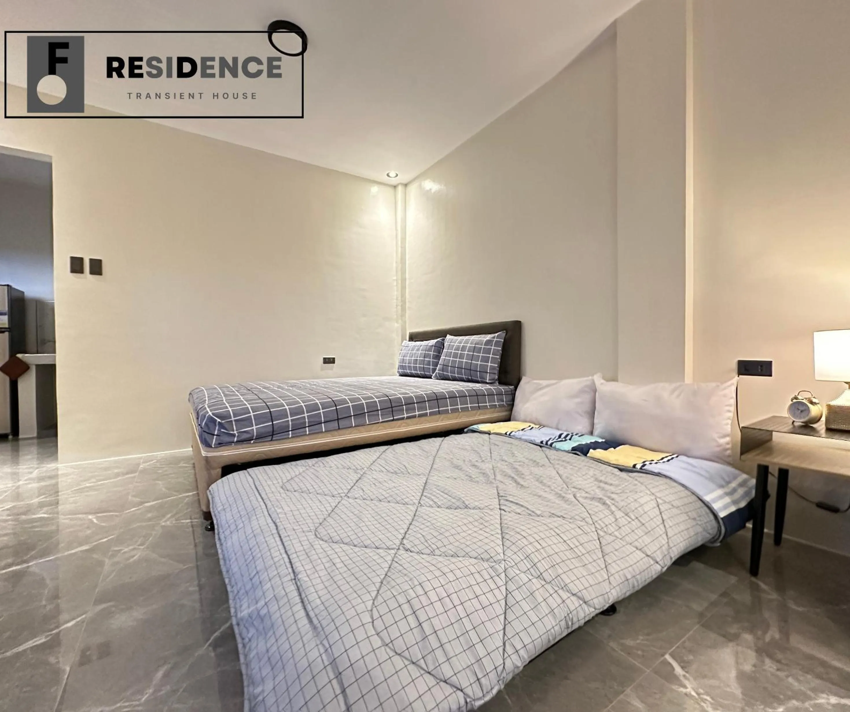 Bed in F Residence Transient House