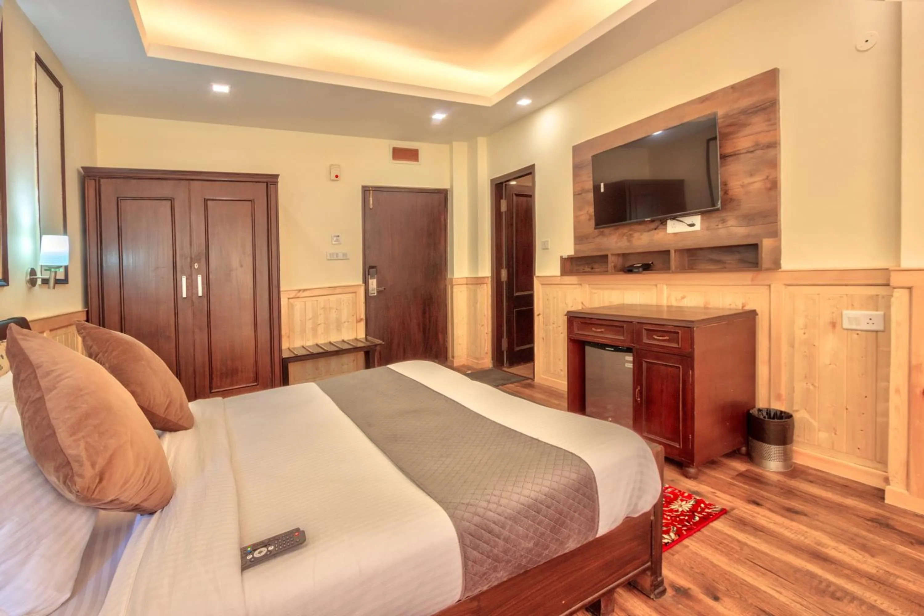 Bed in The Katoch Grand Resort