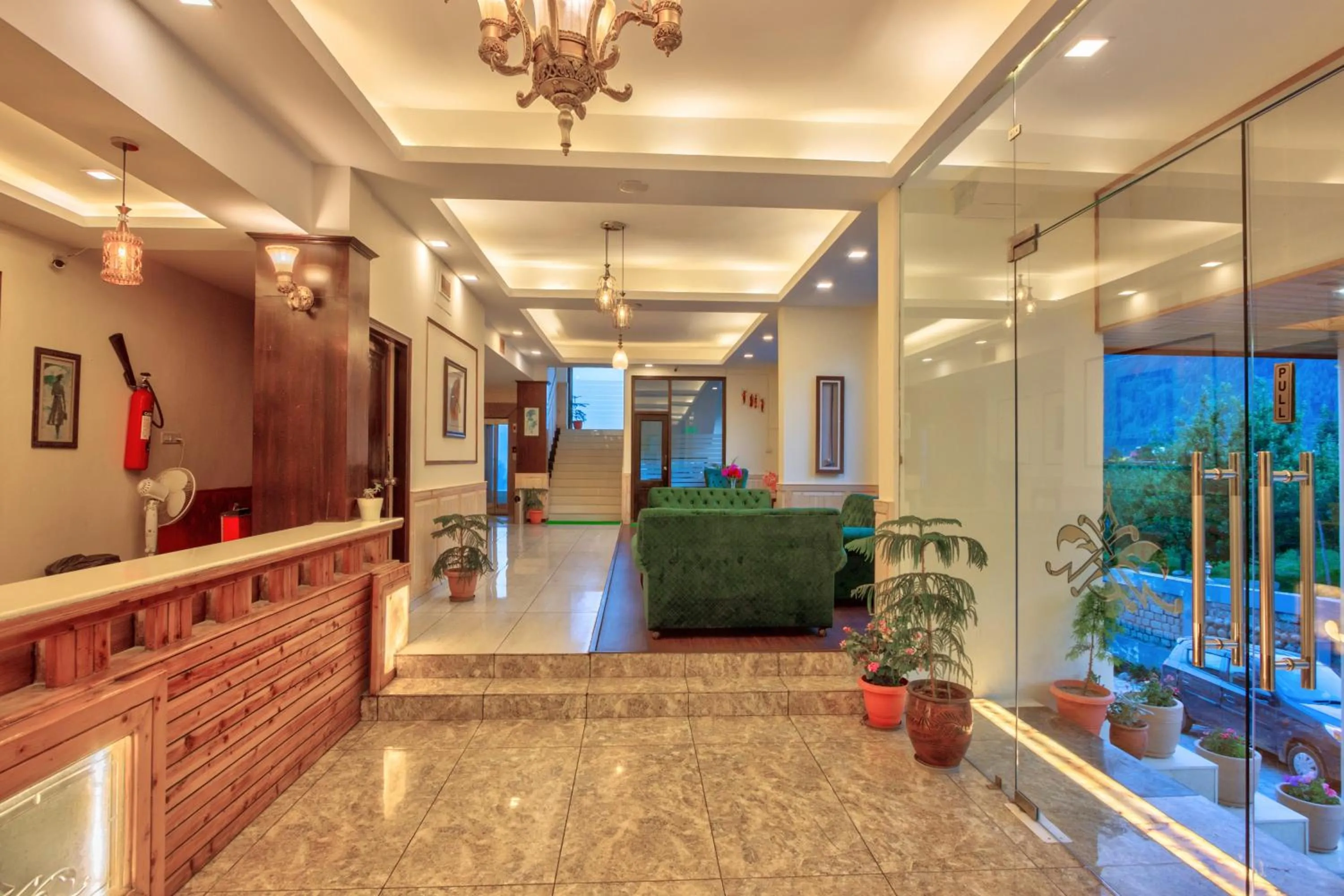 Communal lounge/ TV room in The Katoch Grand Resort