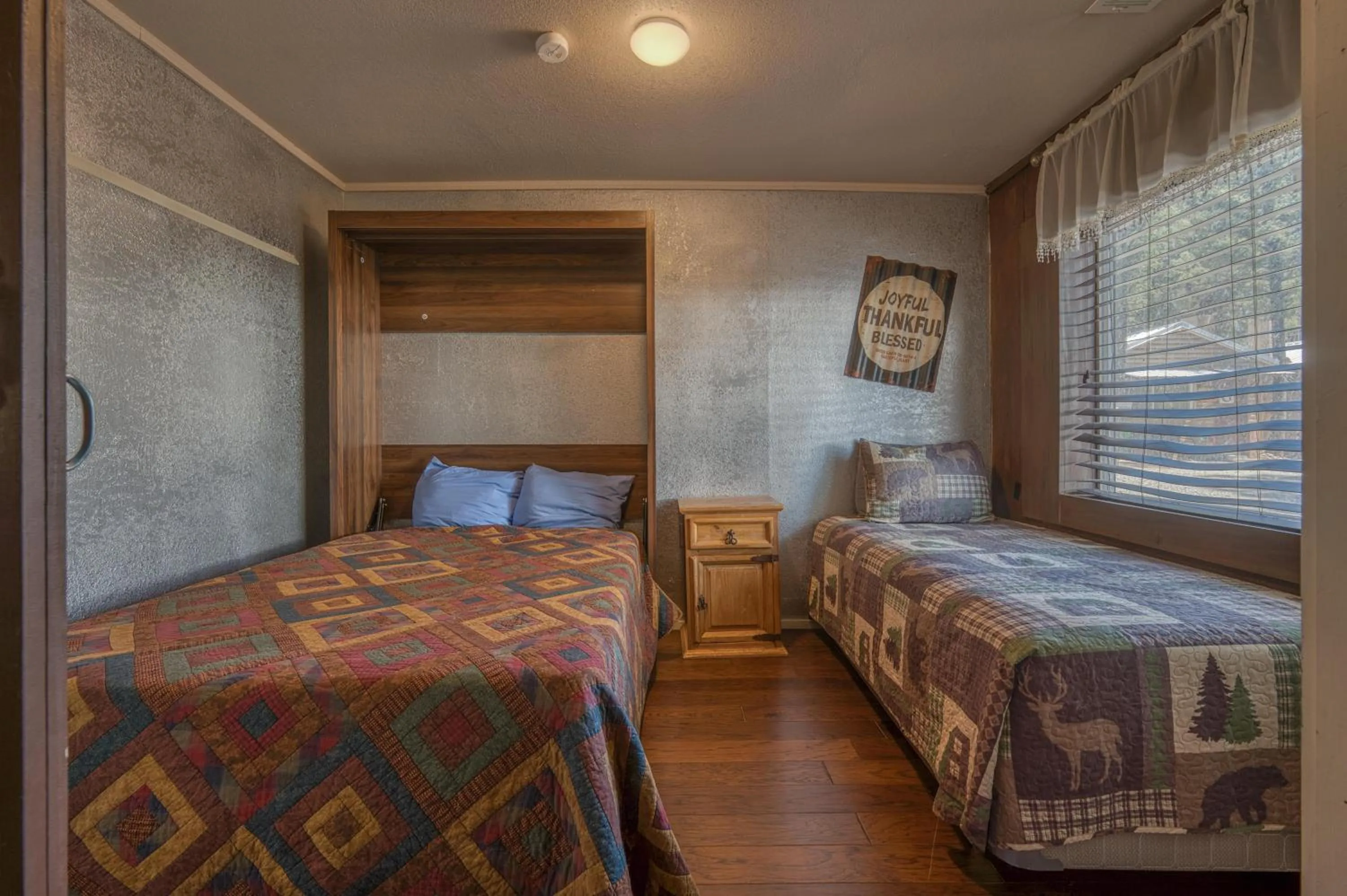 Bed in Enchanted Hideaway Cabins and Cottages