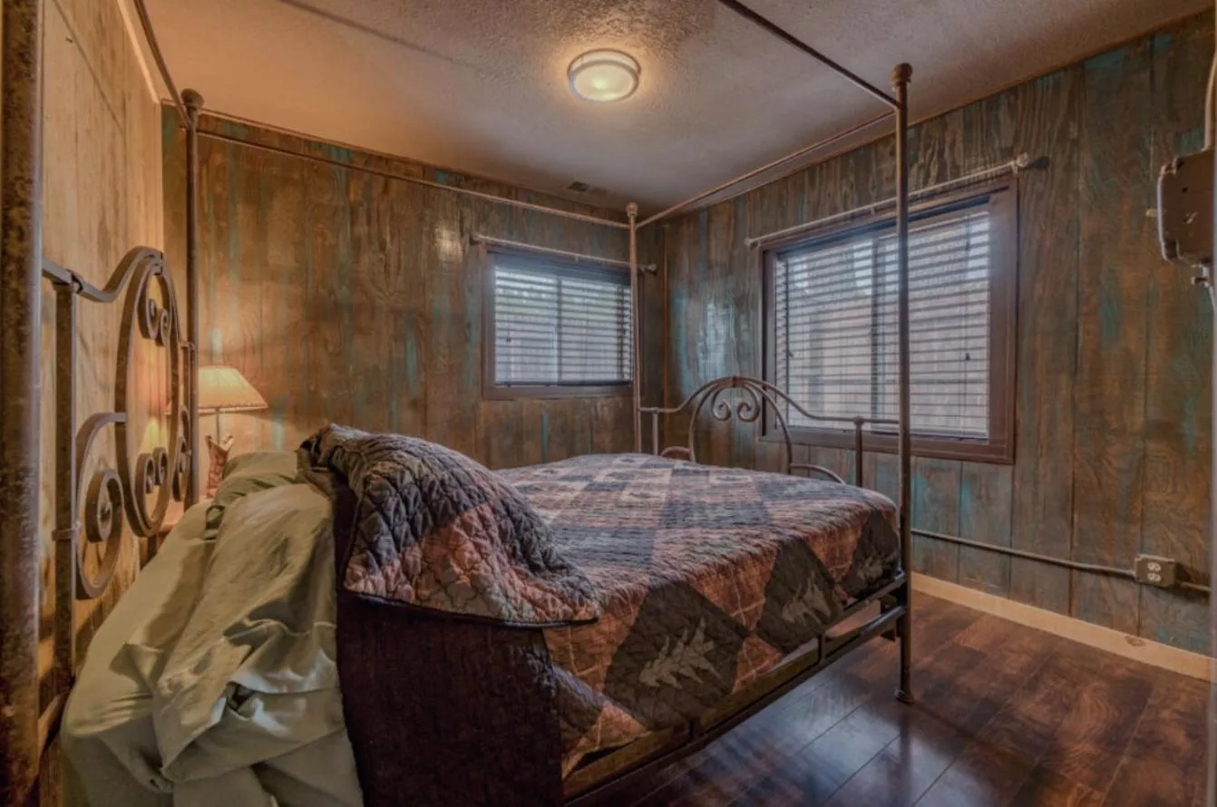 Bed in Enchanted Hideaway Cabins and Cottages