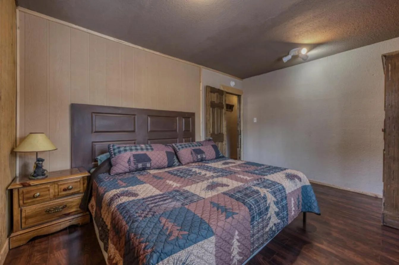 Bed in Enchanted Hideaway Cabins and Cottages