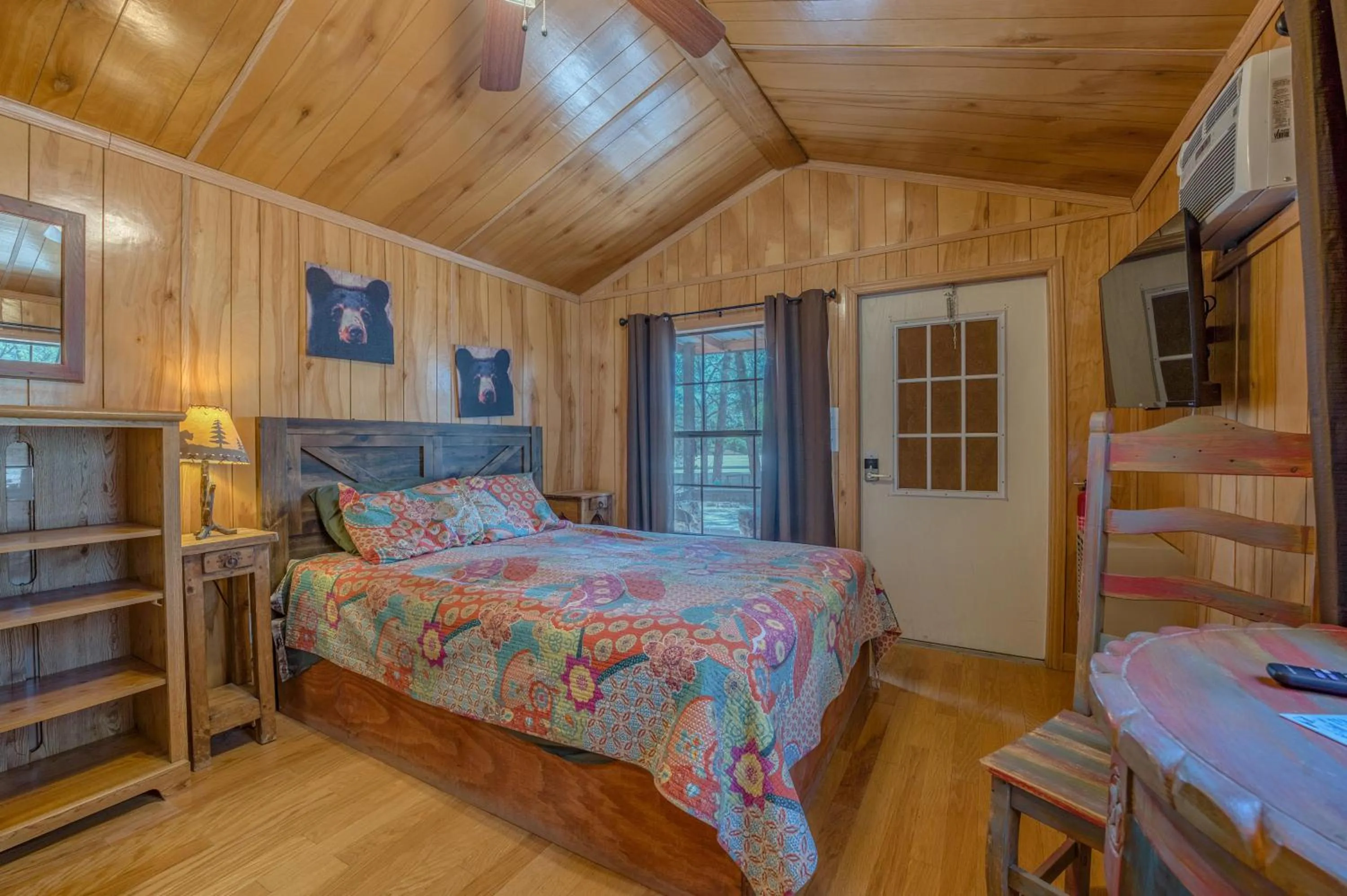 Bed in Enchanted Hideaway Cabins and Cottages