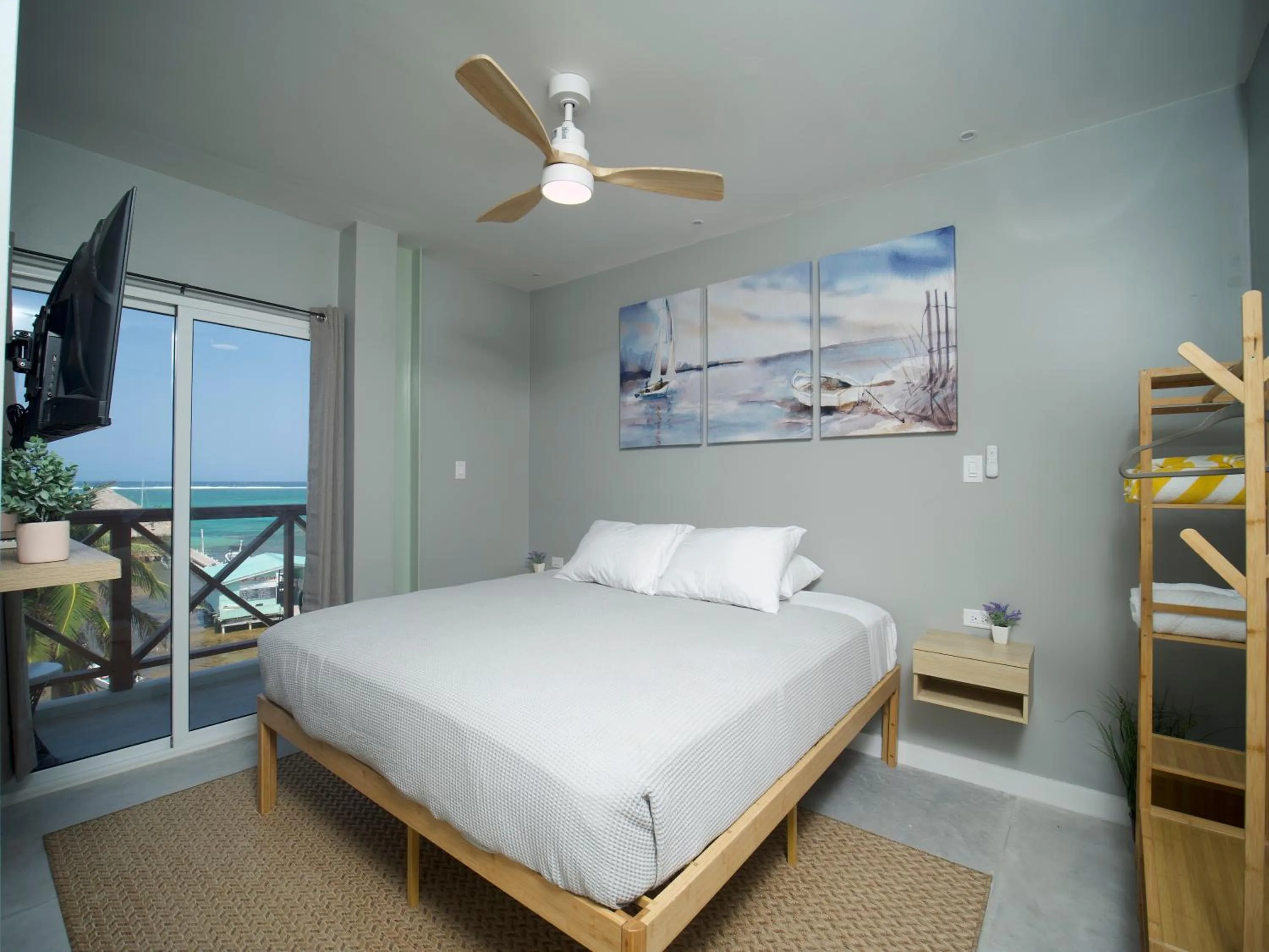 Photo of the whole room, Bed in Sandbar Beachfront Hotel & Hostel Restaurant