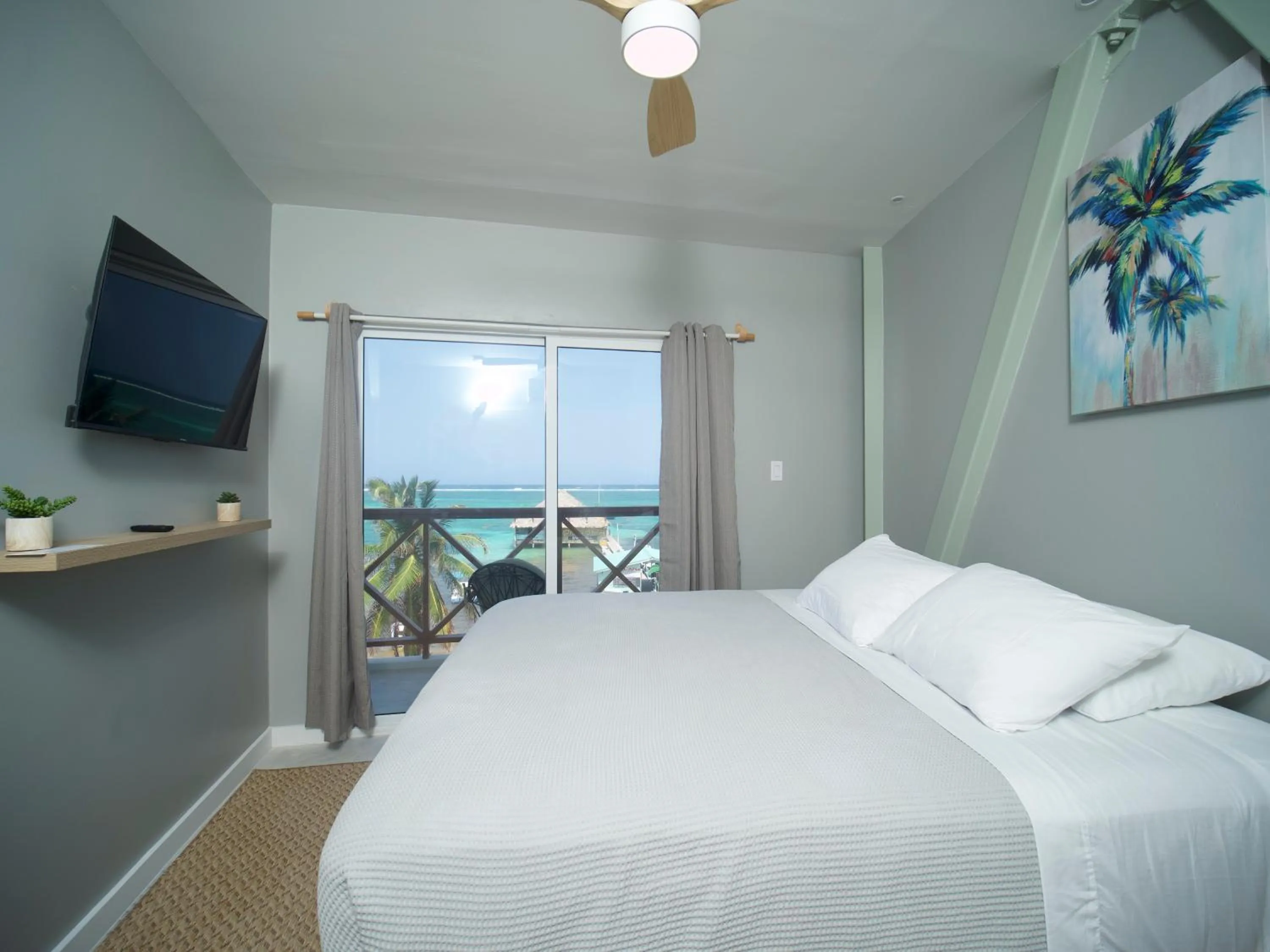 Bedroom, Bed in Sandbar Beachfront Hotel & Hostel Restaurant