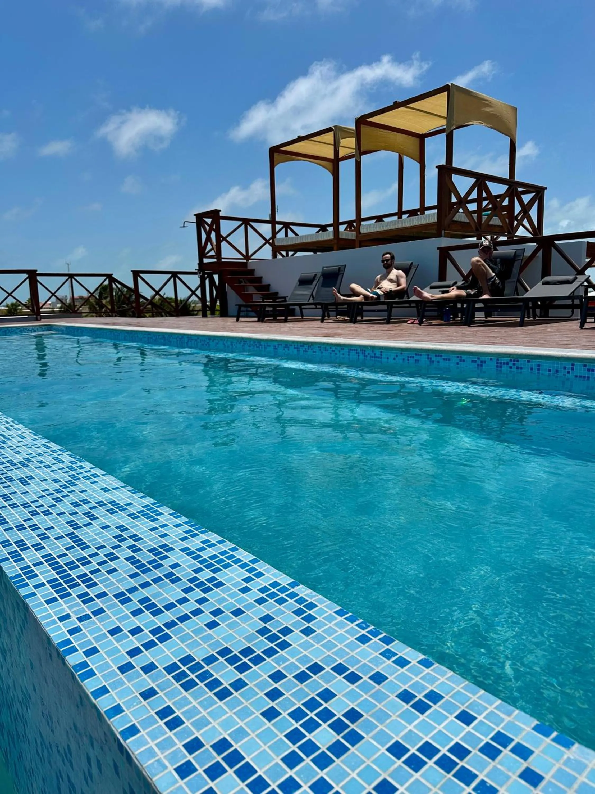 Pool view in Sandbar Beachfront Hotel & Hostel Restaurant