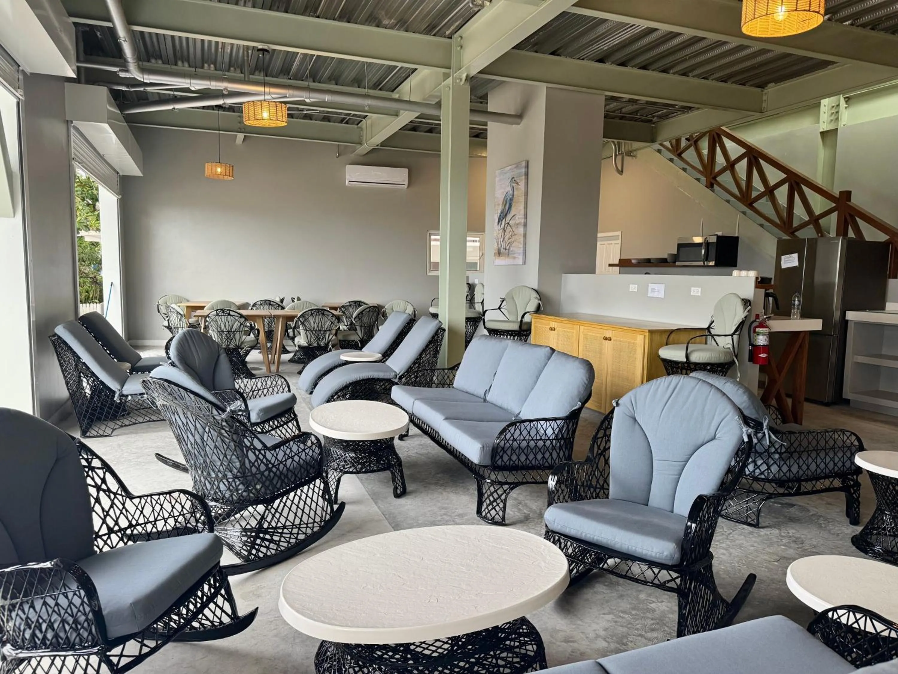 Communal lounge/ TV room in Sandbar Beachfront Hotel & Hostel Restaurant