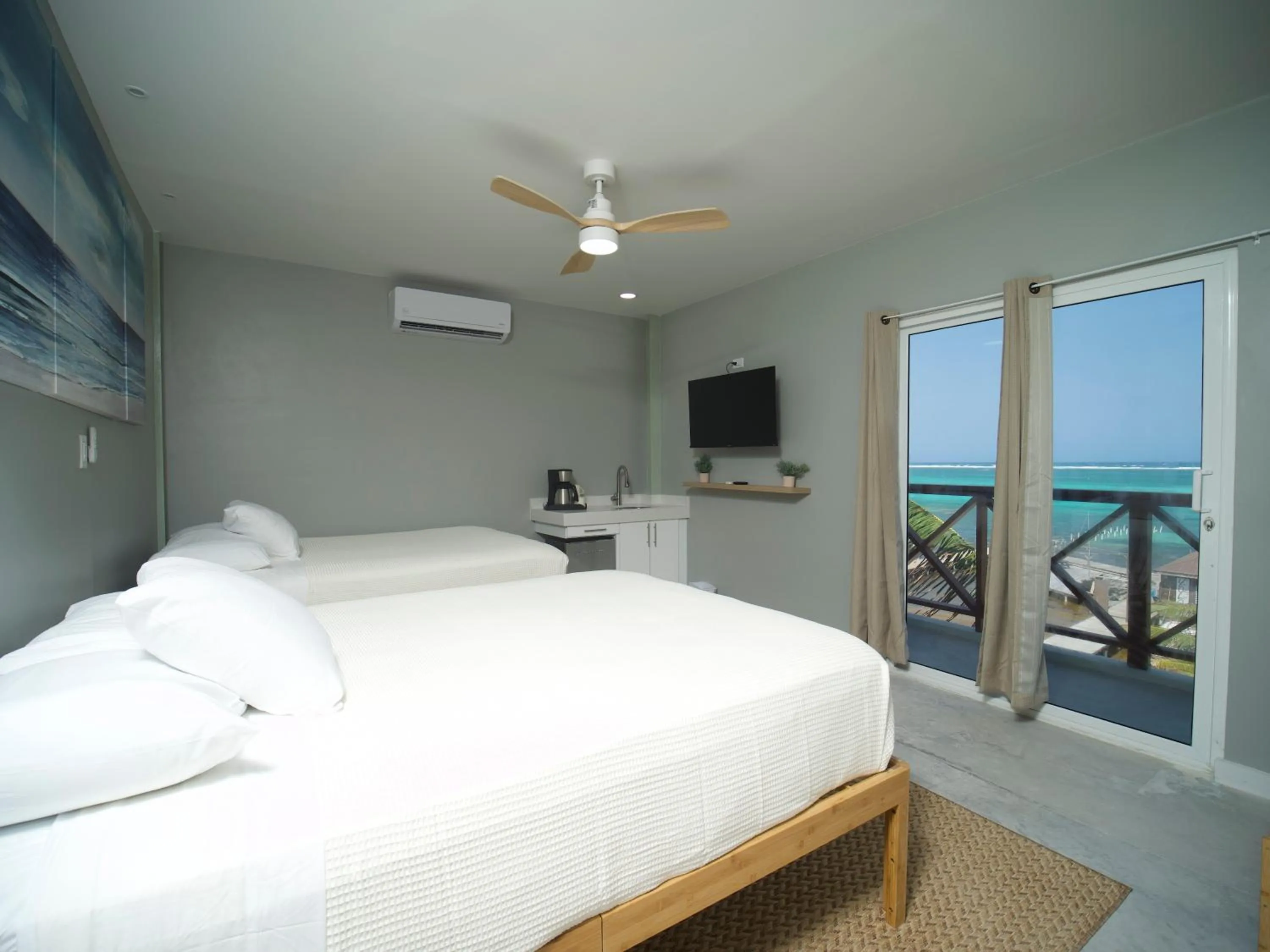 Photo of the whole room, Bed in Sandbar Beachfront Hotel & Hostel Restaurant
