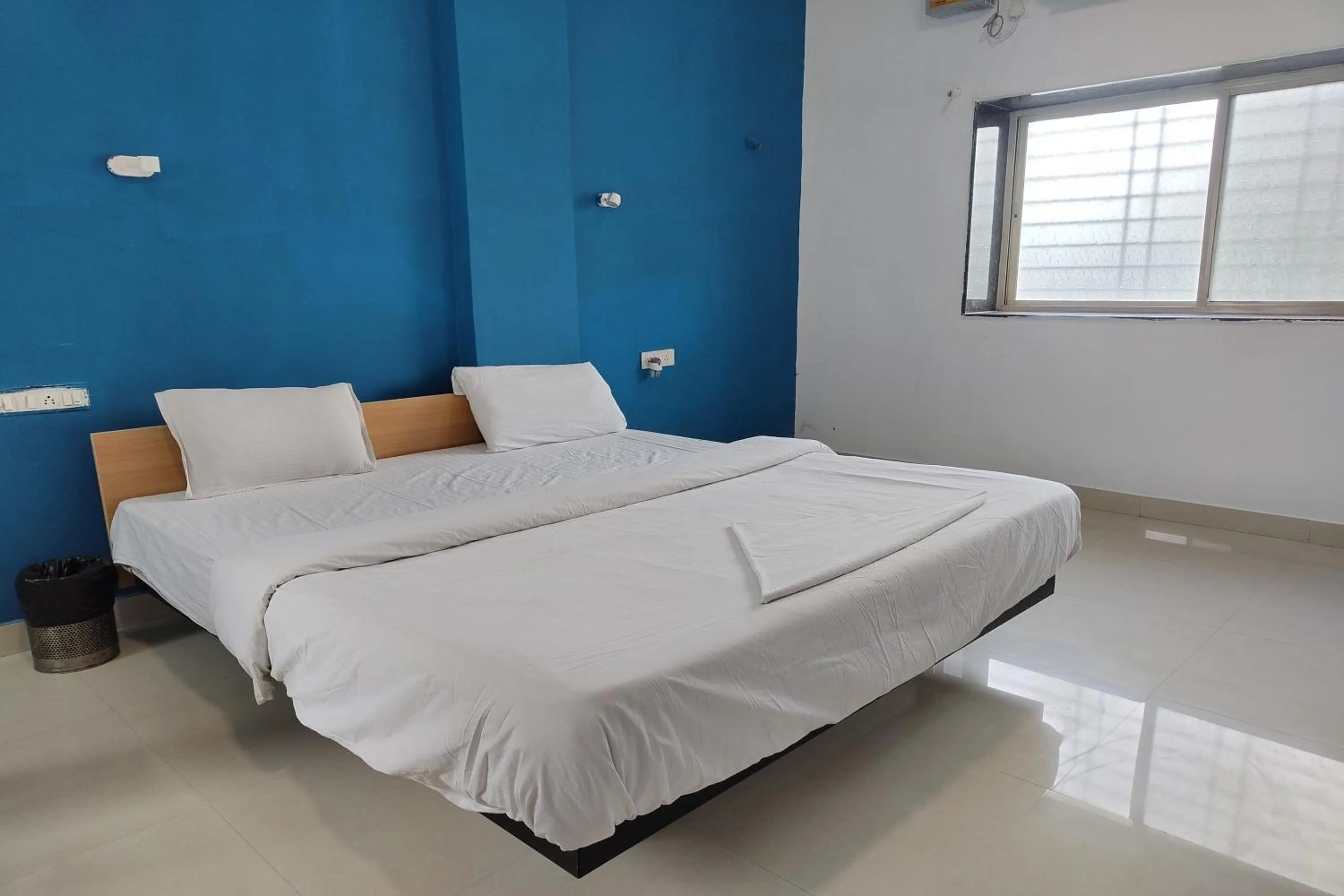 Bed in Hotel Sai Inn Executive