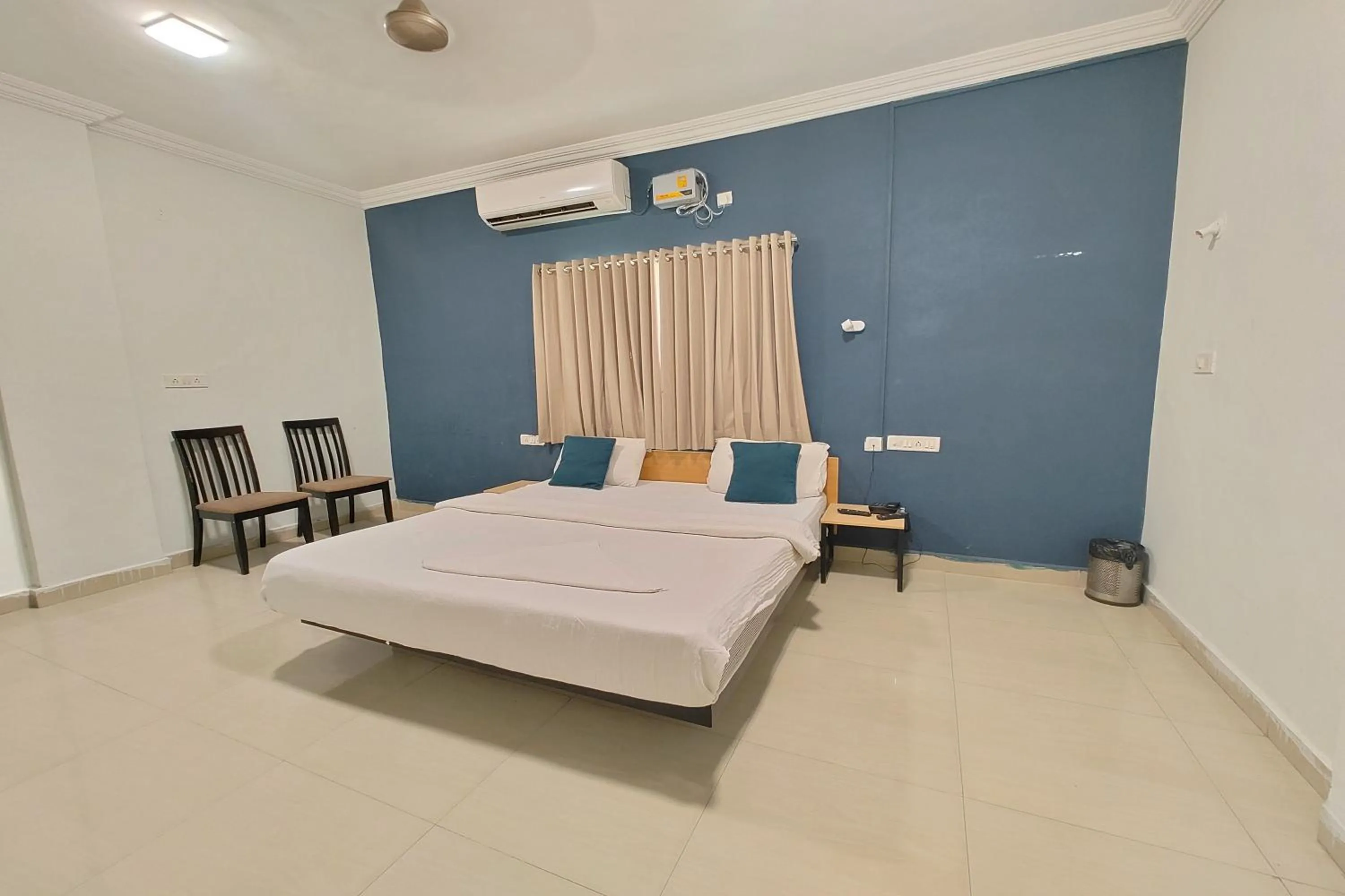 Bed in Hotel Sai Inn Executive