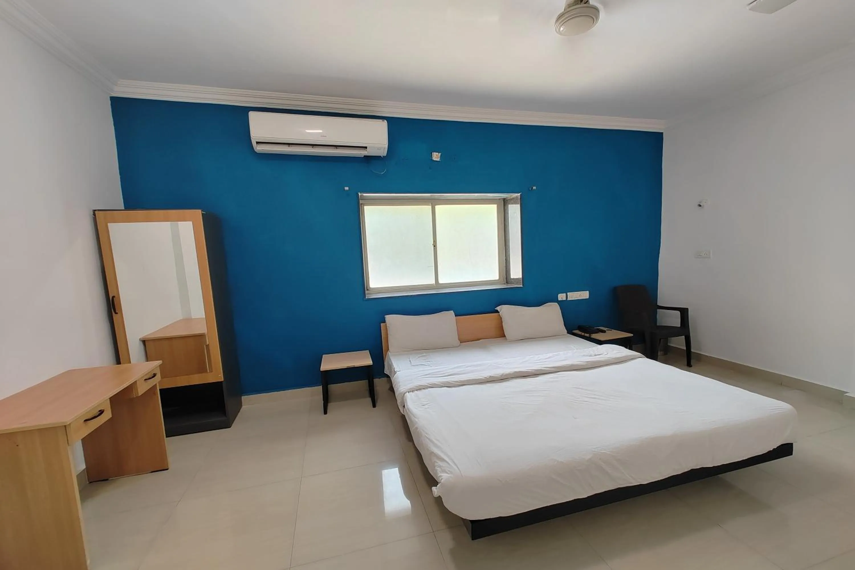 Bed in Hotel Sai Inn Executive