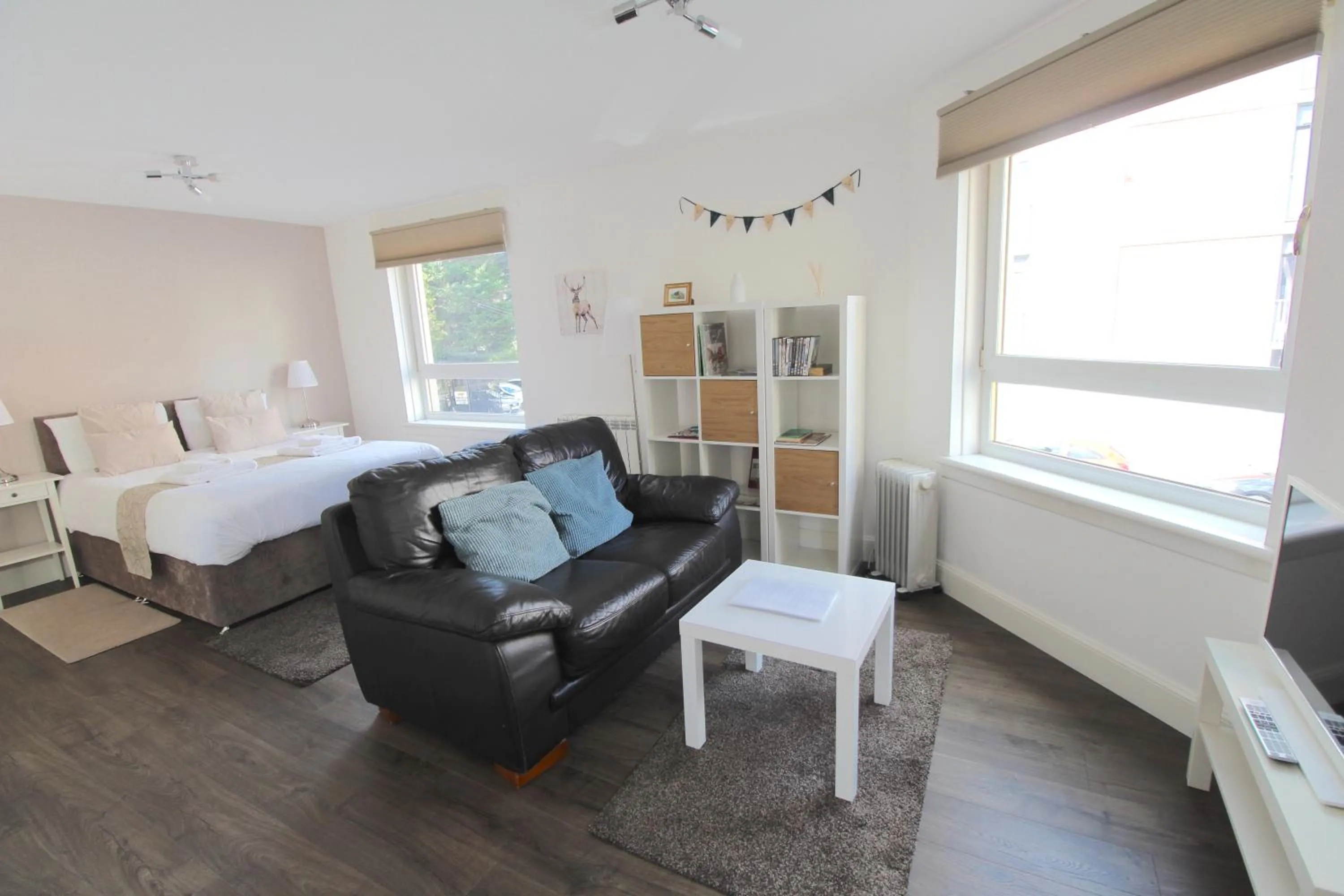 Living room, Bed in Lochrin Apartments by Edinburgh City Apartments