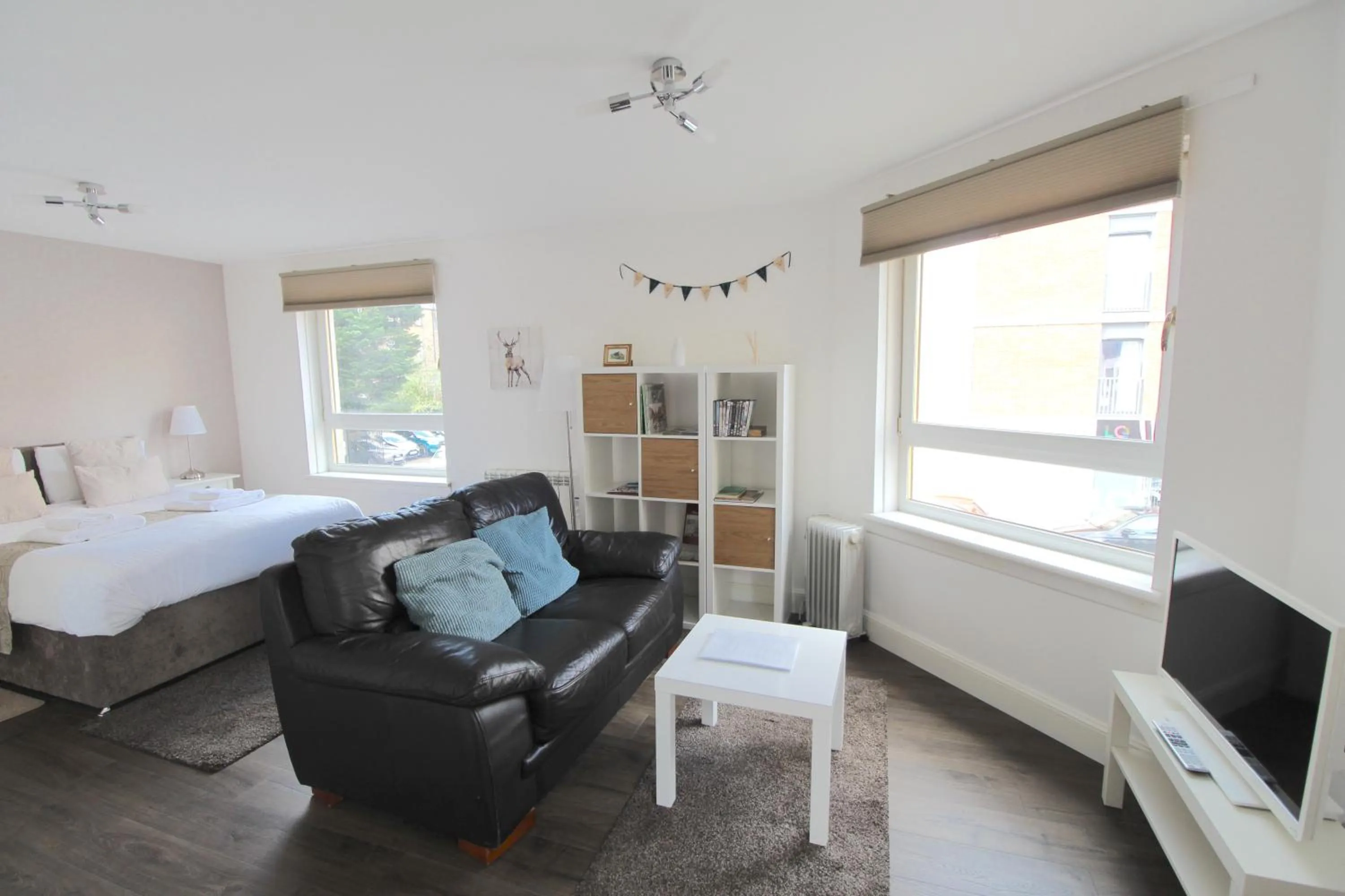 Living room, Bed in Lochrin Apartments by Edinburgh City Apartments