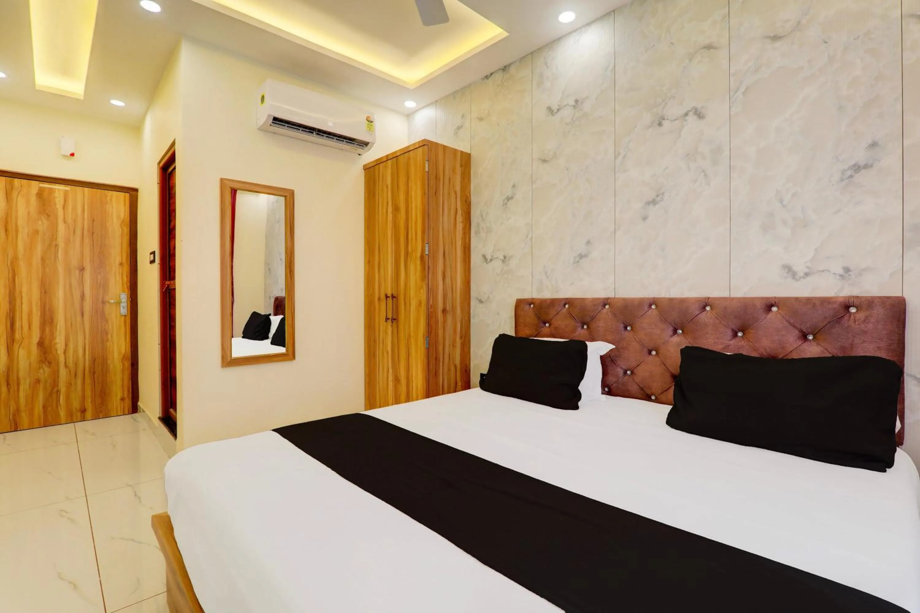 Bedroom, Bed in Super Hotel O Manyam Palace