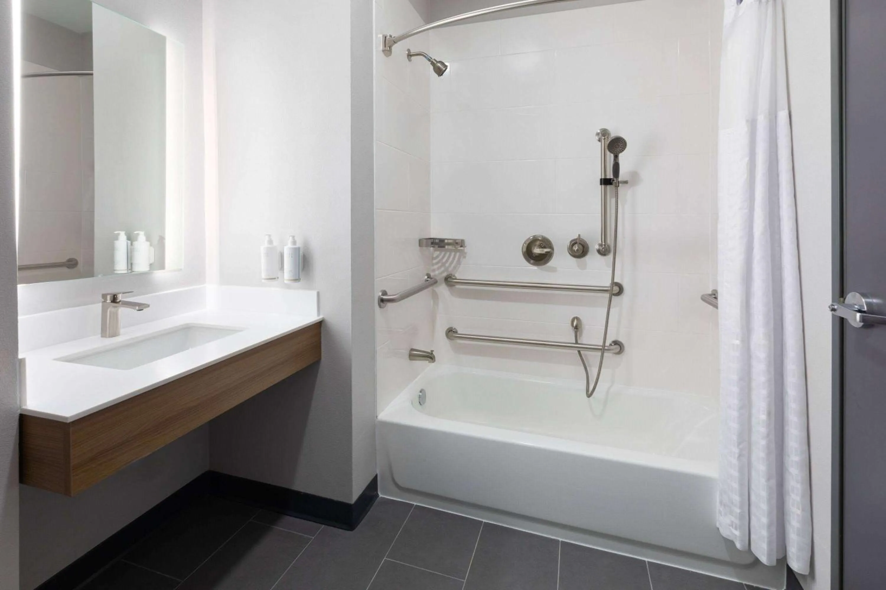 Bathroom in Microtel Inn & Suites by Wyndham Olive Branch